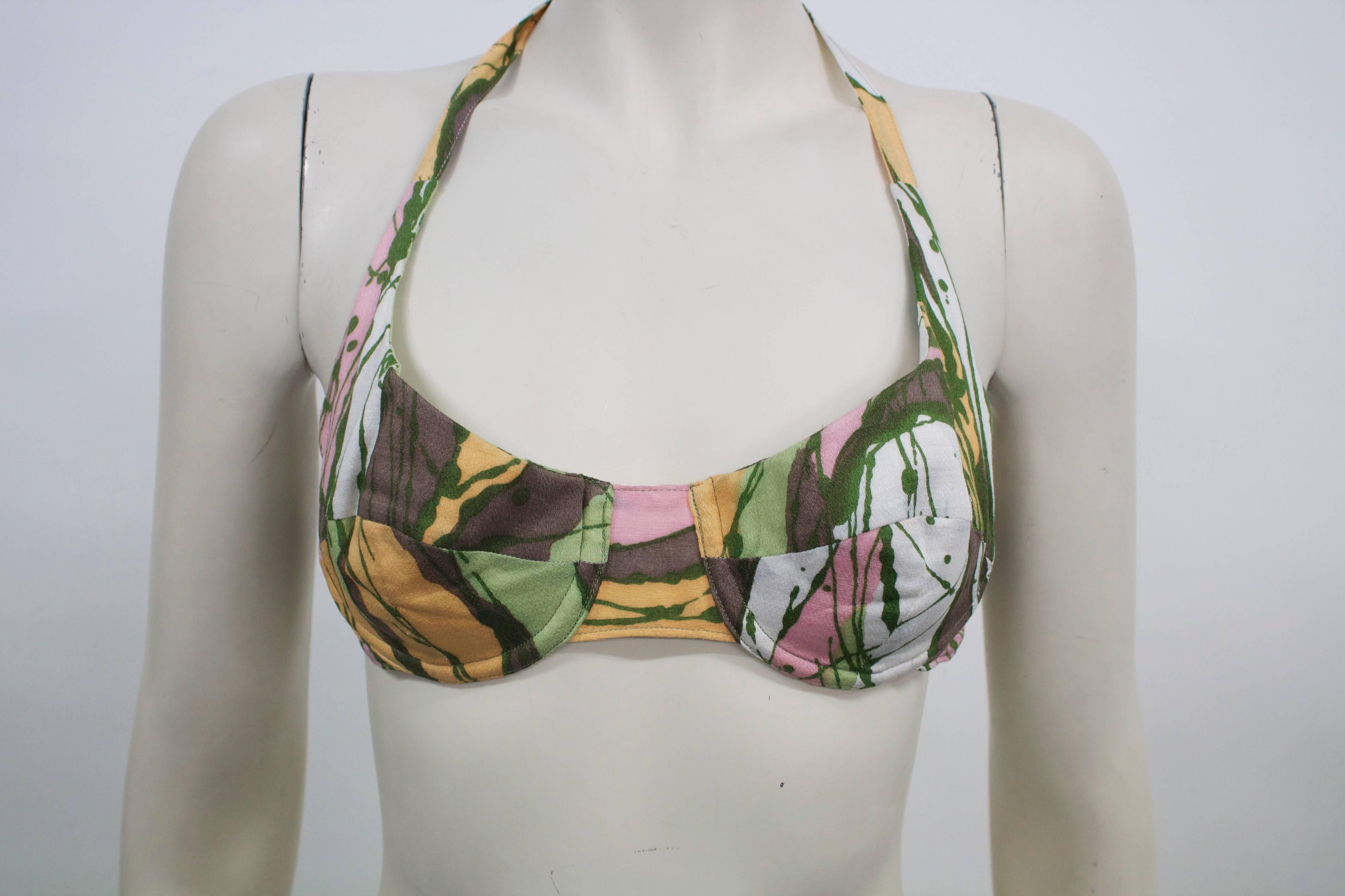 1960s COTTON BIKINI - never been worn!
Rare swimwear-  Made in Italy by Cleonice Capece. Rome, Italy.
Underwire bra cup, elasticated bottom with cute double frill and front bow detail.
Marked size 10 but small fit. 
Cotton and fully lined. 
Multi