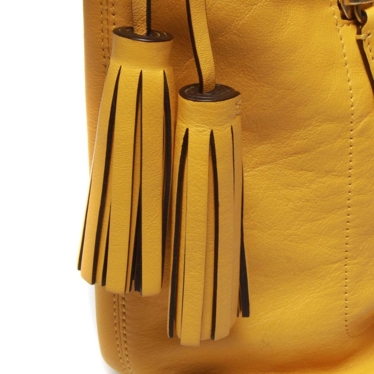 Coach large ladies yellow handbag duffle crossbody with dust cover and