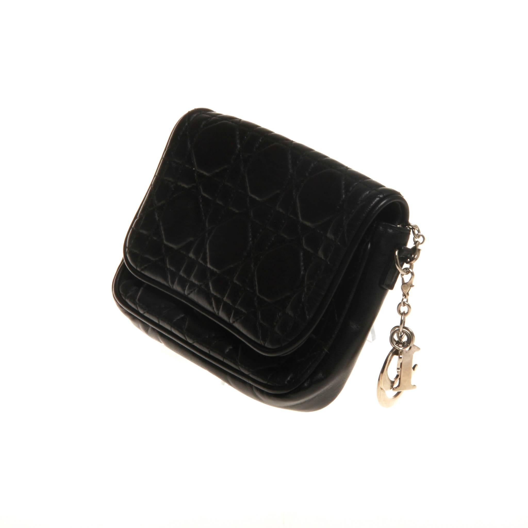 Black Cannage leather Christian Dior mini crossbody bag with silver-tone hardware, single chain-link shoulder strap, tonal leather interior, three card slots at interior wall and magnetic snap closure at front. 

With dust bag.

57cm chain drop.