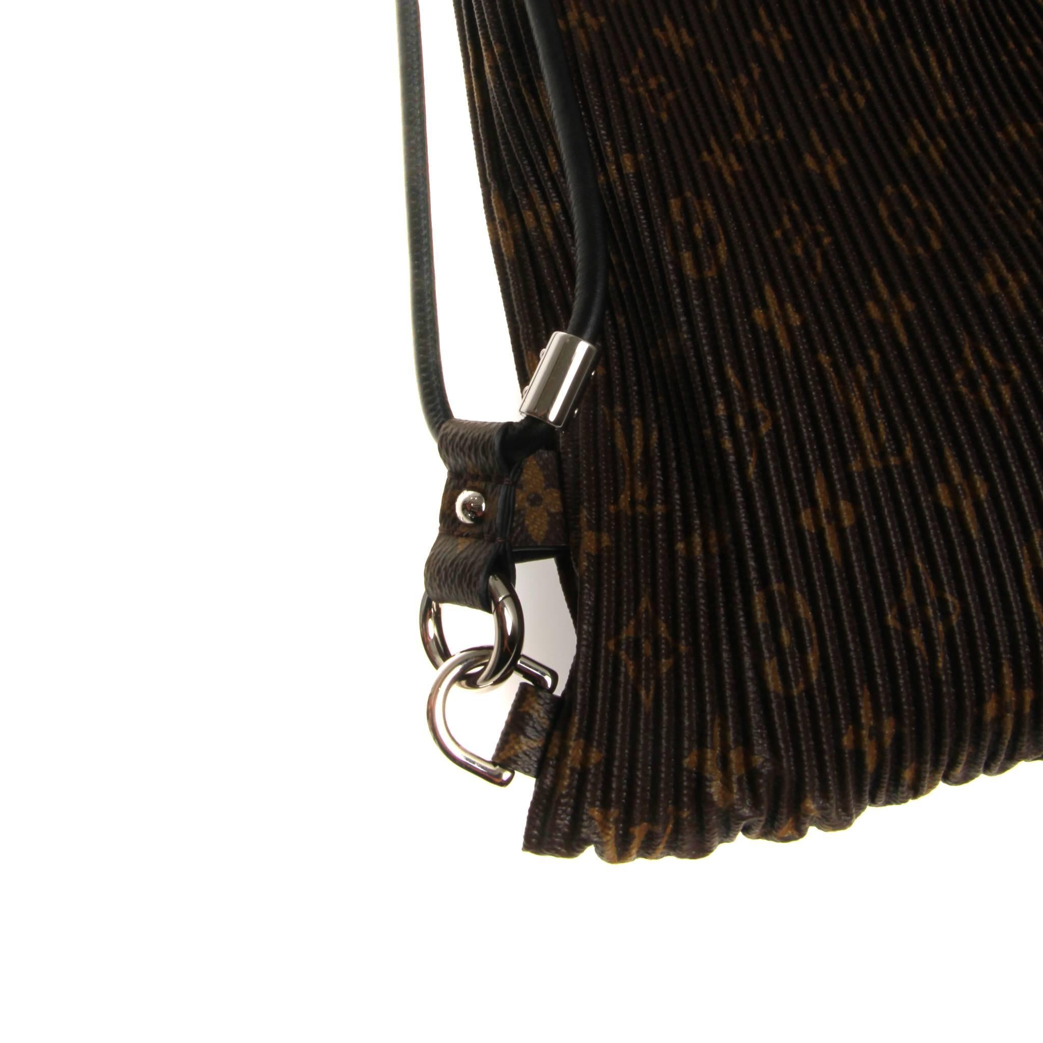 Women's or Men's Louis Vuitton Pleated Monogram Explorer GM Bag