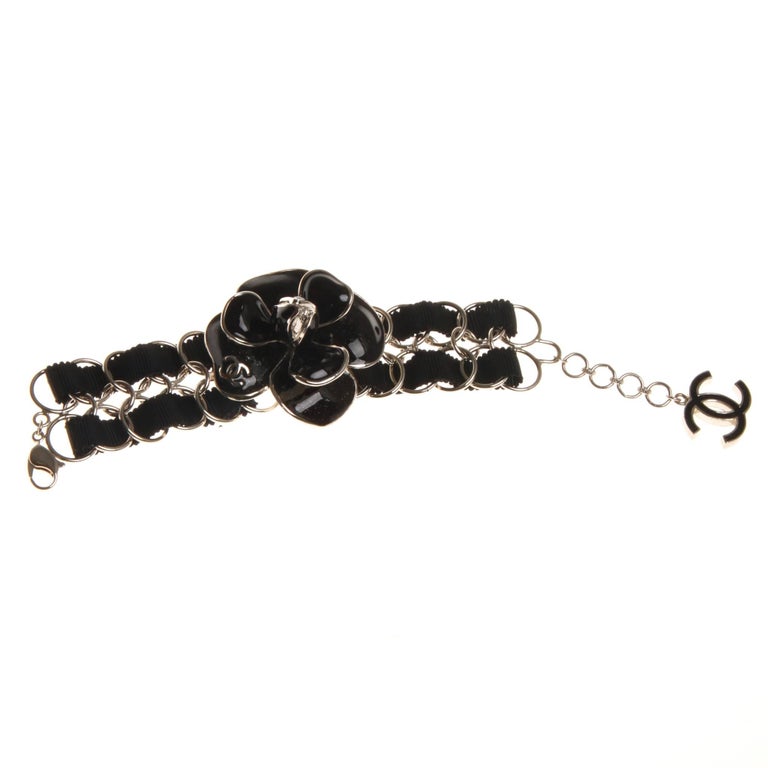 Chanel Black Enamel Camellia Bracelet at 1stDibs