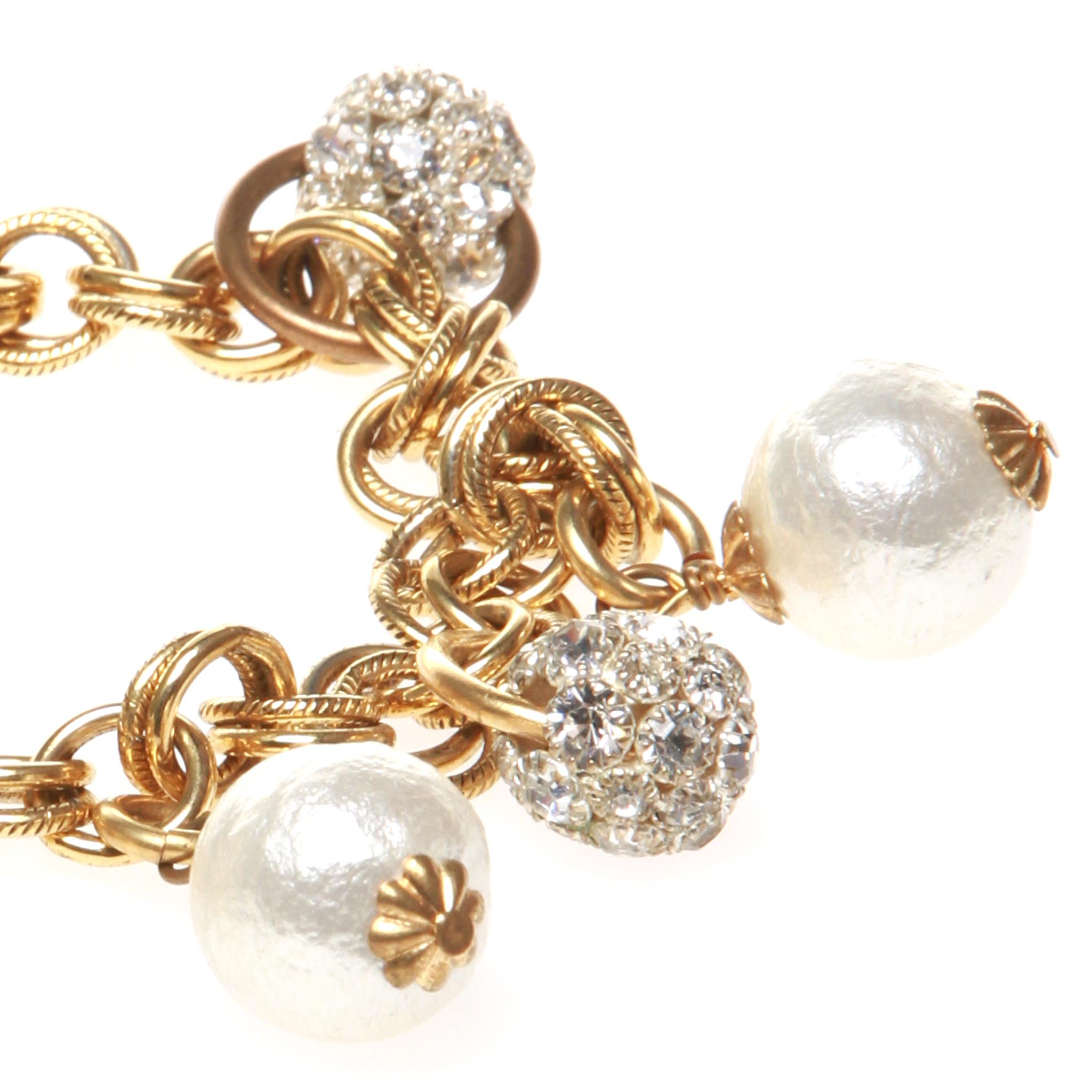 Gold plated John Wind modern vintage chain bracelet featuring crystal encrusted and pearl beads.