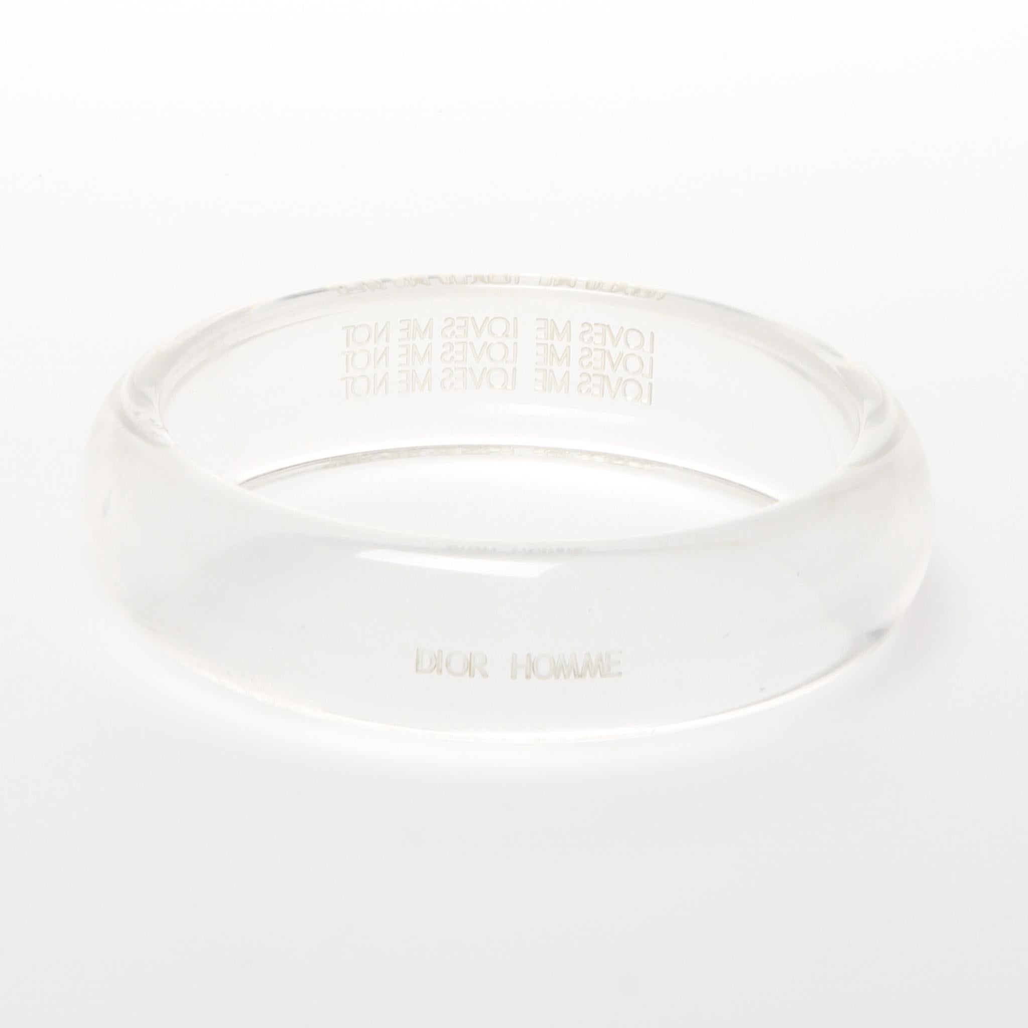 Rare Dior Homme bangle from Heidi Slimane's SS07 debut collection. Laser engraved with DIOR HOMME and LOVES ME LOVES ME NOT. 