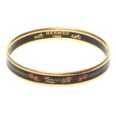 Hermes black enamel and gold bangle
