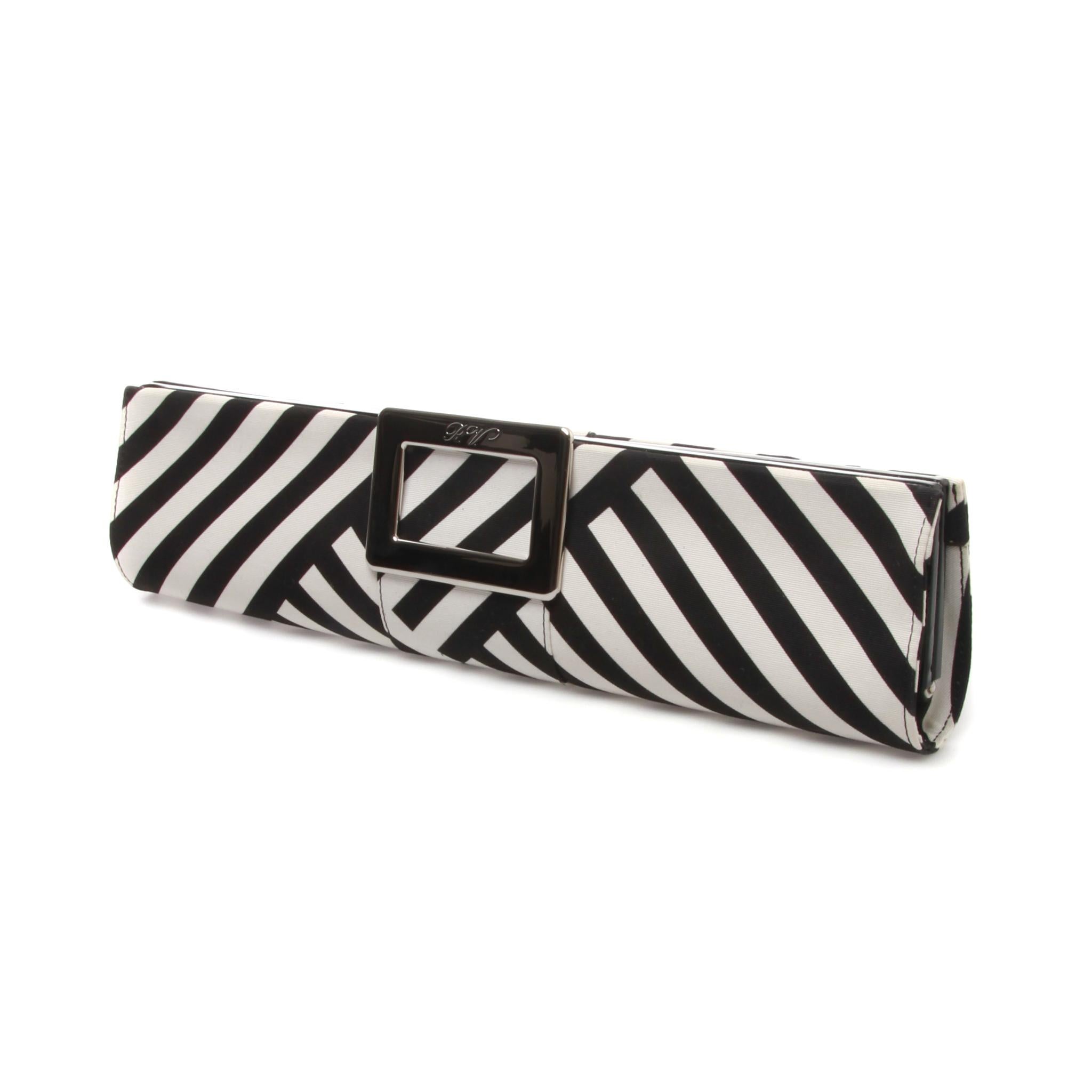 Another elegant yet fun piece from Roger Vivier! 
This clutch has a signature silhouette and can be carried at any daytime or evening event!
Made of black and white asymmetrical striped cotton, this accordion-opening style bag is soft and is lined