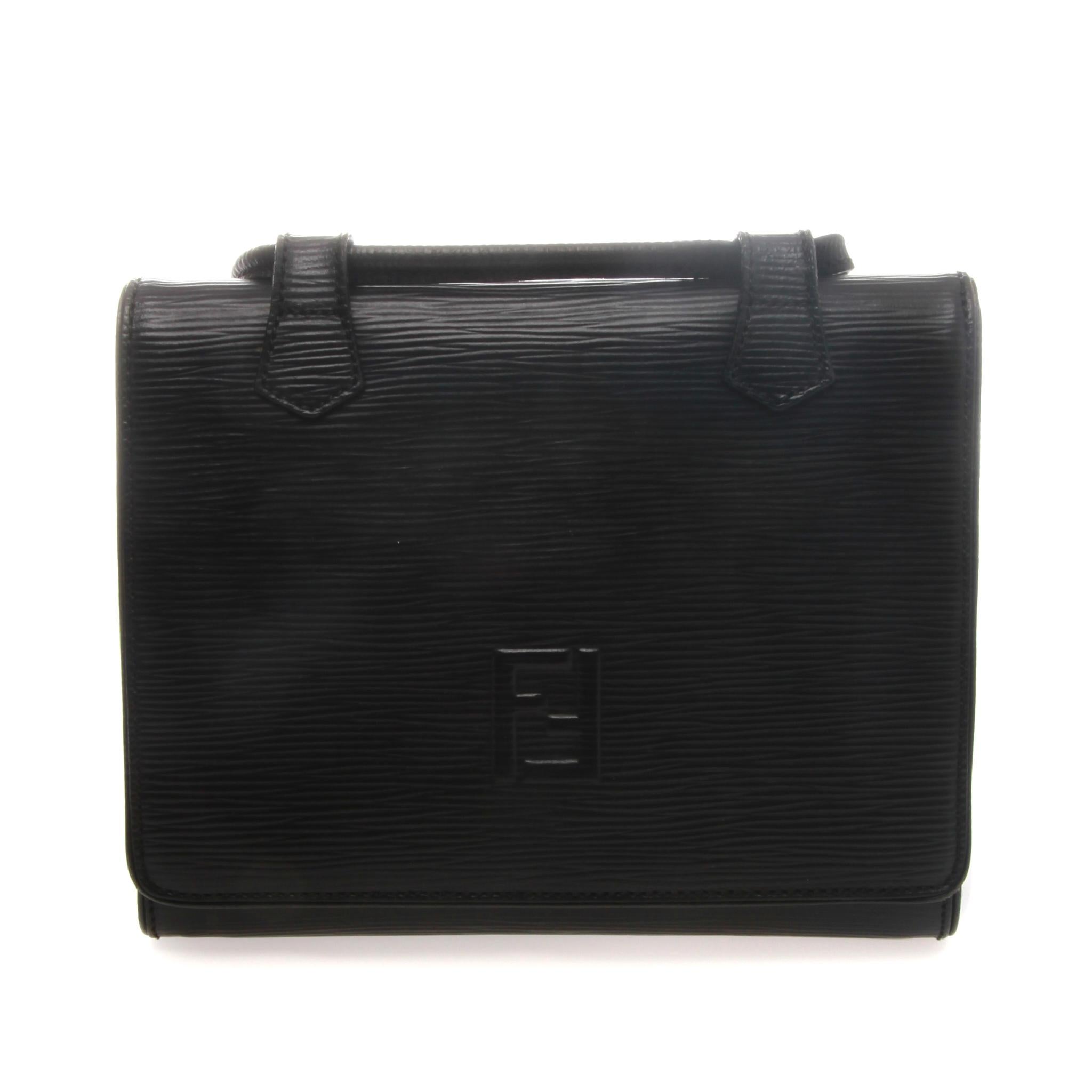 Highly collectable Vintage Fendi Black Epi Leather Cross Body Bag.
Beautifully crafted from black Epi leather, this structured bag features long leather straps. 
The bag is secured with a recessed flap with magnetic snap closure. 
Interior is lined