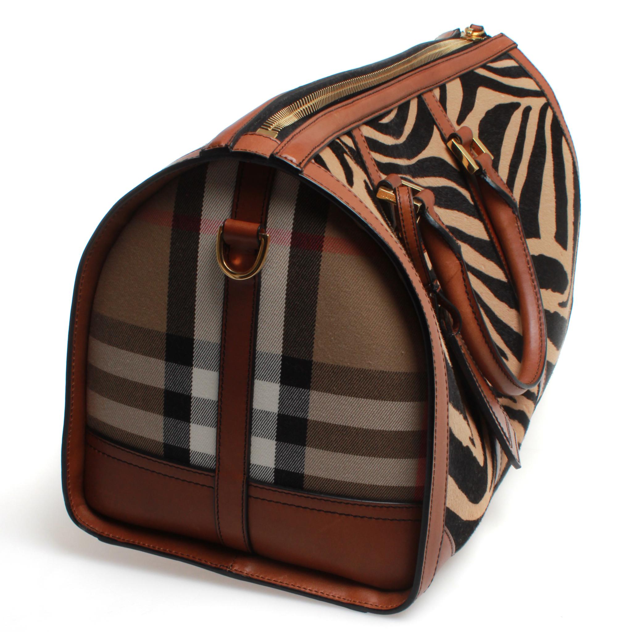 Burberry Prorsum Duffle Bag Brown Zebra Pony Skin & Classic Print. This is a 2013 collection bag. It has been used just once & since been in storage. It has the original dust bad and smells brand new. It has gold hardware and dark brown leather and