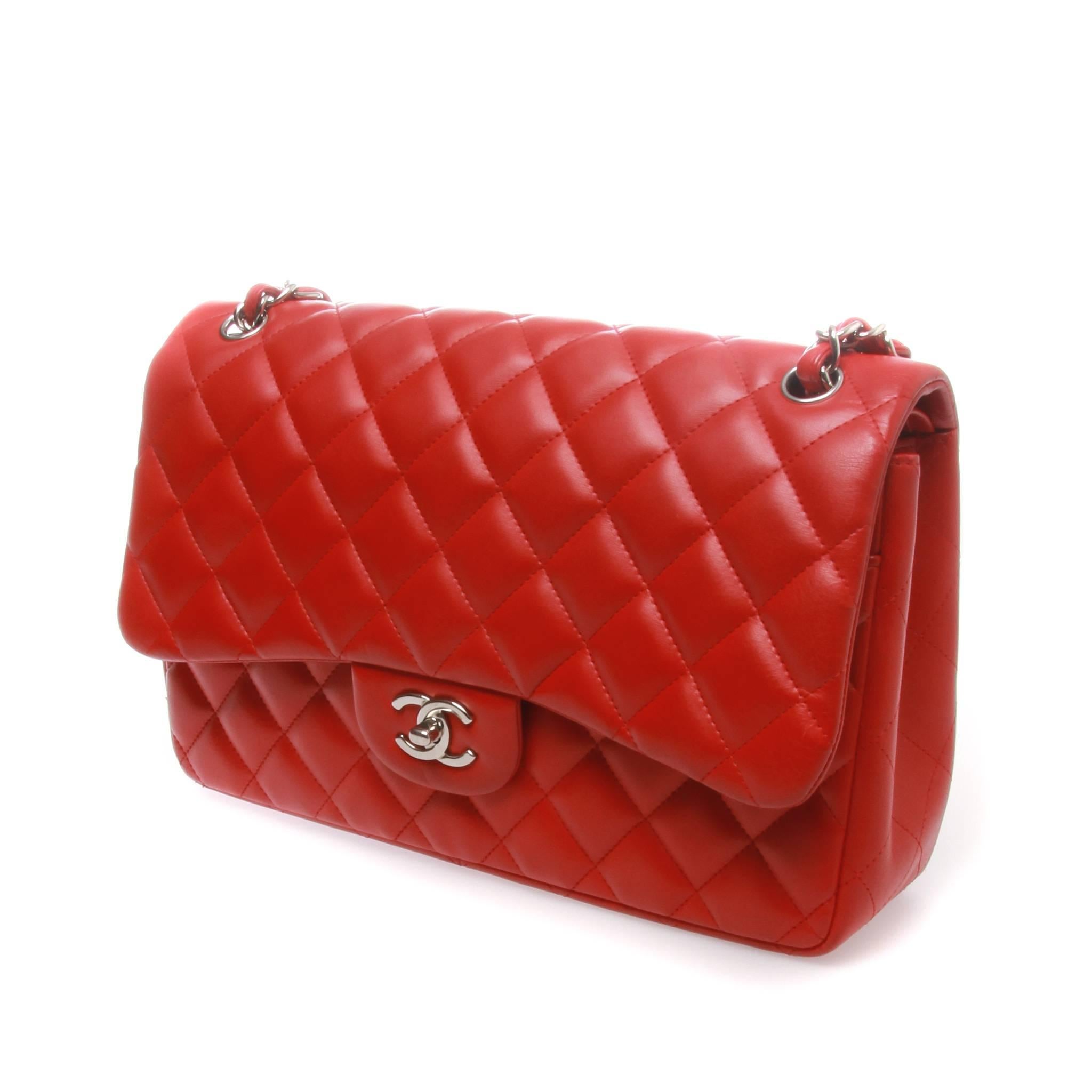 This Chanel dark red quilted lambskin leather classic jumbo double flap bag is perhaps the most sought after bag in Chanel's classic collection. 
This particular bag features quilted lambskin leather that is durable and classy and also features a