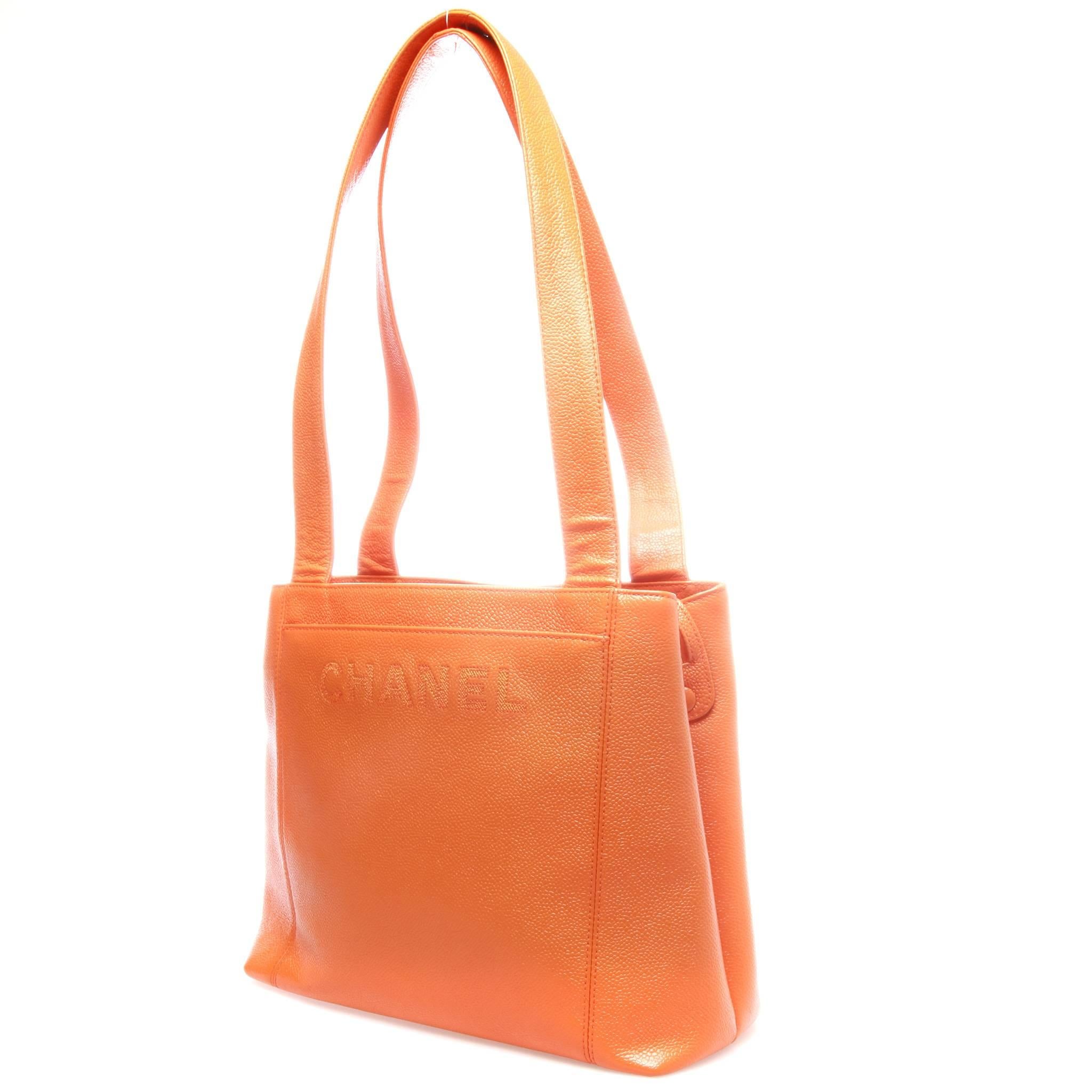 FINAL SALE
Madam Virtue & Co

Immaculate condition orange caviar leather chanel tote with gold-tone hardware, dual flat shoulder straps, dual exterior pockets, embroidered logo at front, matching orange grosgrain lining, dual open interior pockets