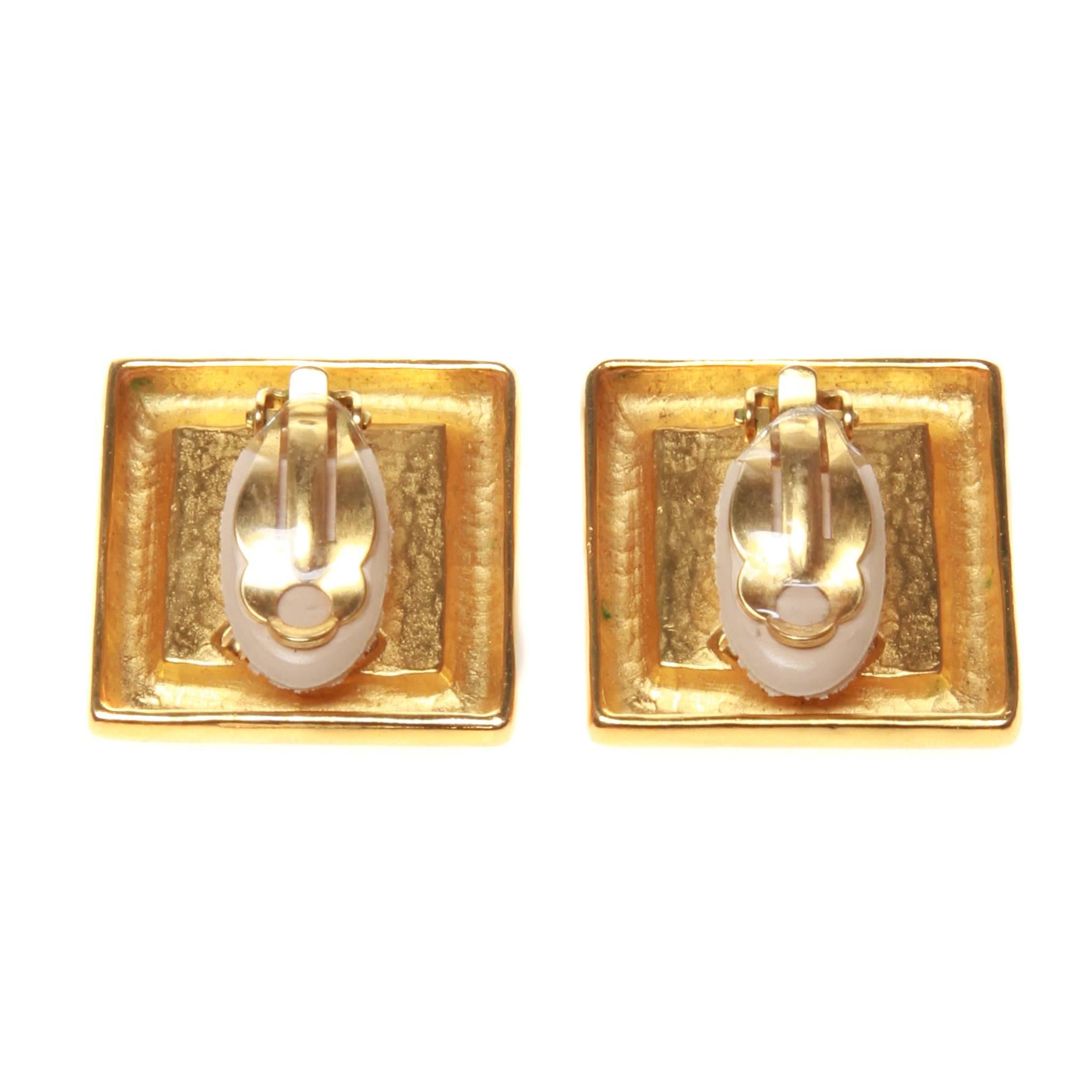 Karl Lagerfeld clip-on earrings featuring the KL monogram framed in a simple square design. 

