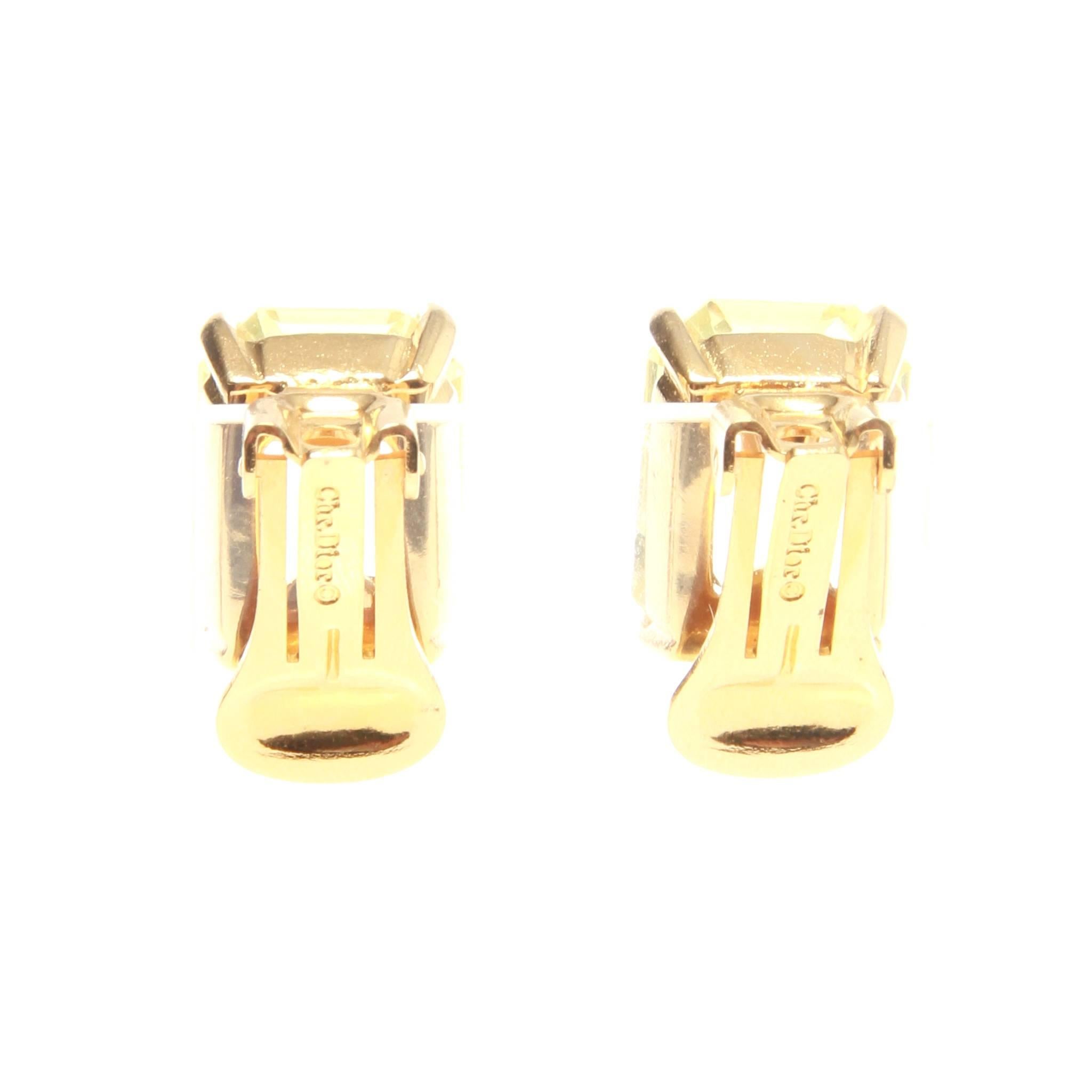 Christian Dior vintage clip on earrings featuring a lemon toned rectangular stone and gold-tone hardware. Engraved 'Chr Dior' at back.