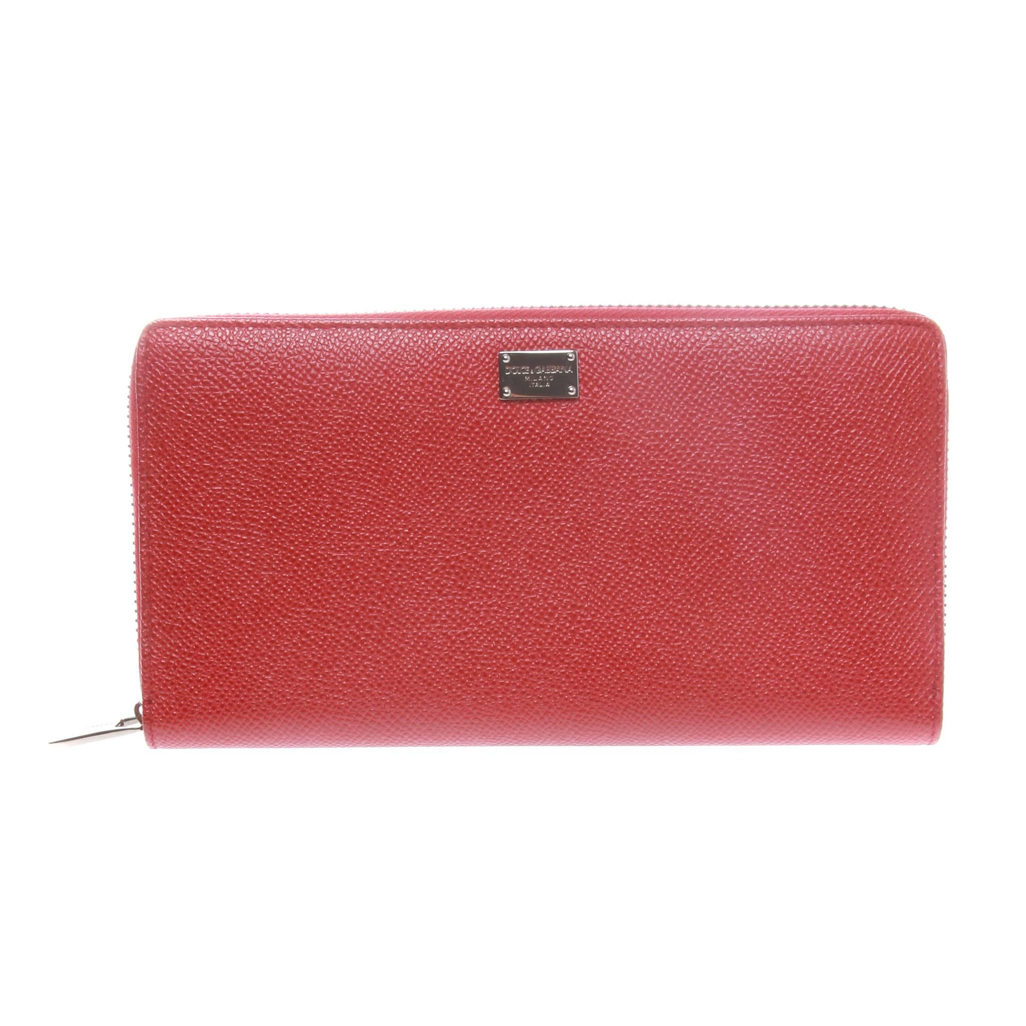 FINAL SALE

An eye-catching red adds zest to a textured calf leather zip around wallet designed with triple compartment,
adorns a zip up internal coin pouch, and silver hardware for keeping everyday essentials well-organized and secure.
Punctuate