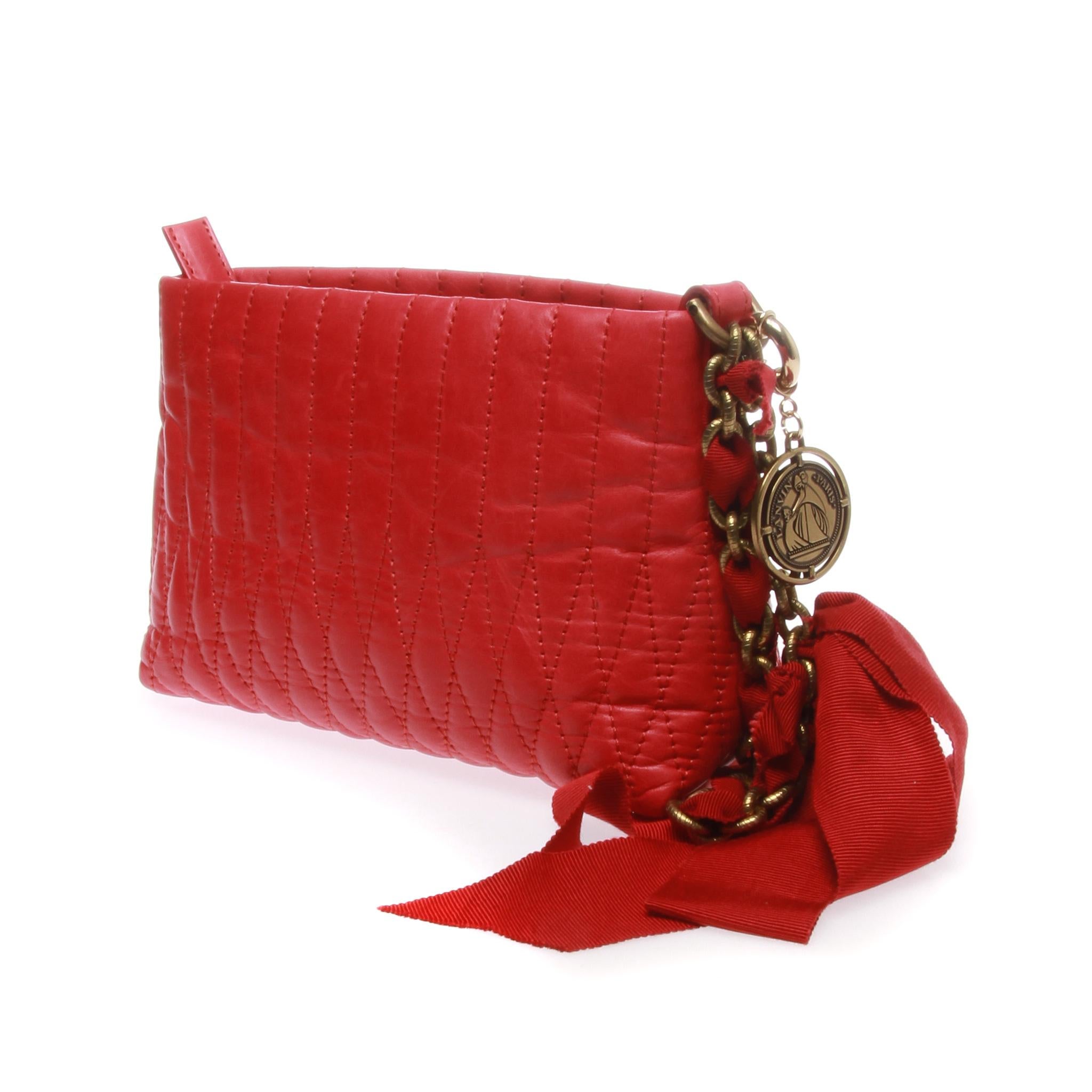 LANVIN Red 'MINI HAPPY' Quilted Leather Clutch

An eye-catching red Mini Happy clutch by LANVIN.
It features a red lambskin quilted leather clutch with happy charms and fabric ribbon on the antique brass metal chain with a zip closure.