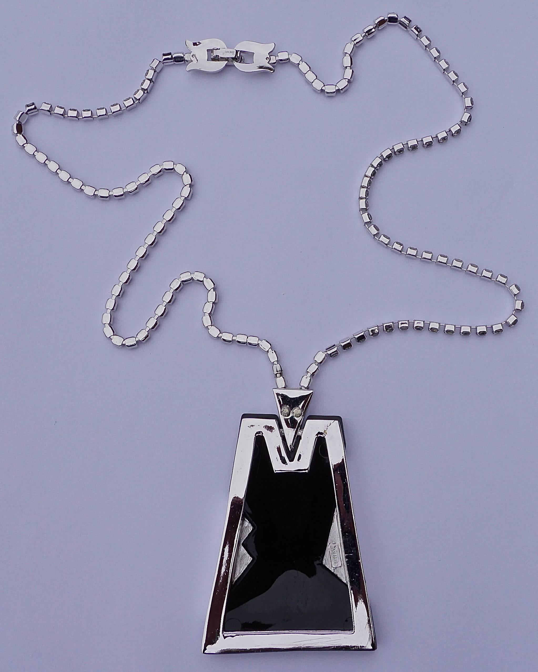 Vintage silver tone necklace, featuring a beautiful black lucite and rhinestone pendant, circa 1970s. Stamped Trifari on the reverse of the pendant and the clasp. The Art Deco style pendant measures 4.8cm / 1.9 inches, graduating to 2.8cm / 1.1