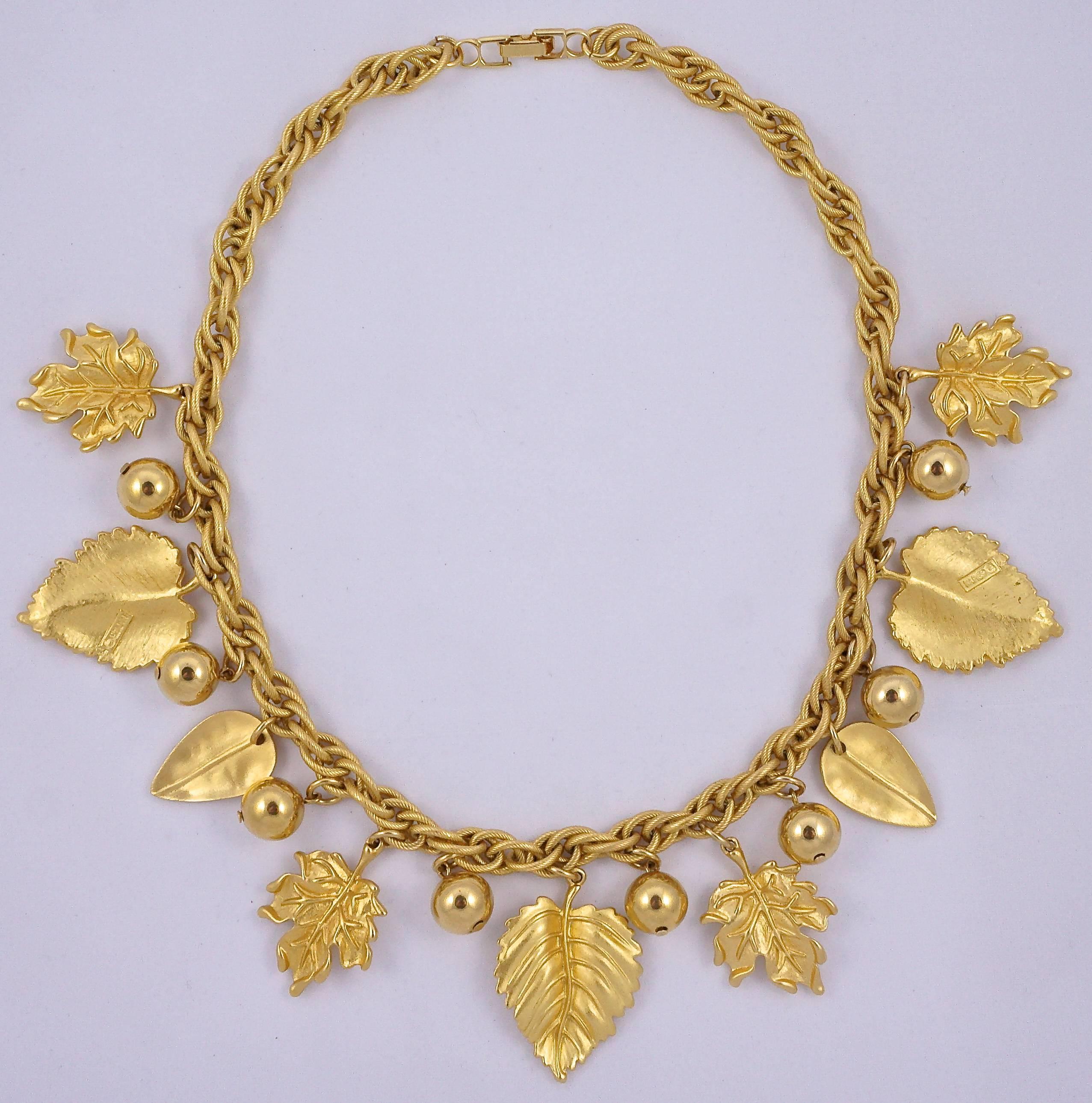 Fabulous Napier gold plated necklace with a fancy link rope design. Dropping from the necklace are shiny balls and matt textured leaves. The clasp is stamped, and so are the larger leaves. Length 46cm, 18 inches, and the large leaves are 3.2cm, 1.2