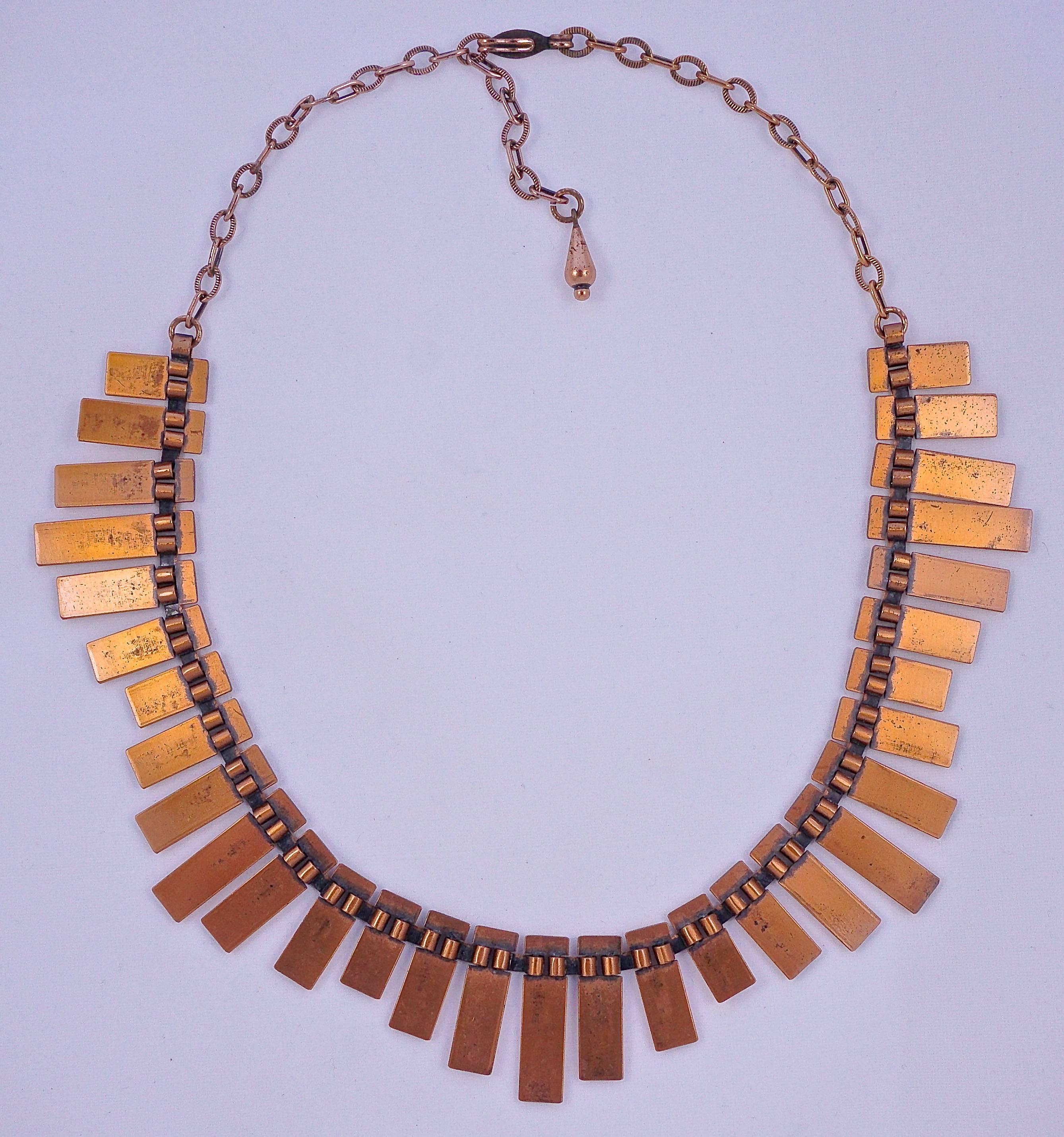 Wonderful Renoir shiny copper necklace with long rectangular drops linked together, forming an Egyptian inspired necklace. Length 45.5cm, 18 inches, and the longest drop is 2.5cm, 1 inch. The chain is adjustable, and features alternating fancy and