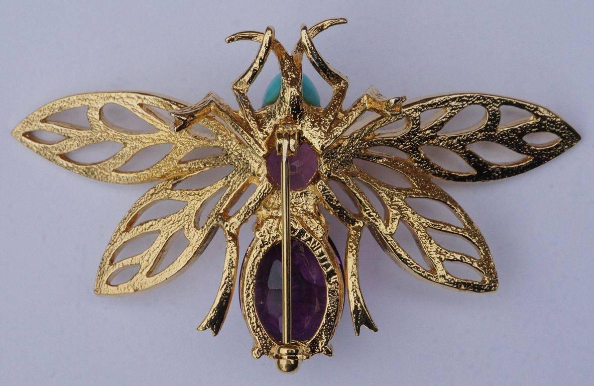 Panetta gold tone bee brooch set with faceted amethyst glass stones for the body, and a turquoise glass head.

This is a fabulous stylish statement brooch in very good condition.

Beneditto Panetta emigrated from Naples, Italy in 1901 and after