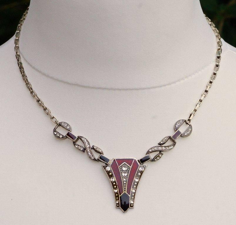 Lovely Pierre Bex antique finish silver plated Art Deco style necklace with crystal rhinestones and enamel. The pendant features a plain black and textured red enamel finish. The necklace measures length 43.7cm / 17.2 inches, and the pendant is 3cm
