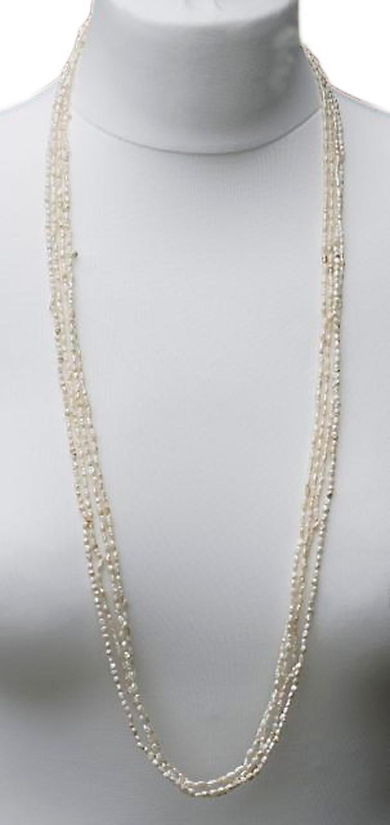 Four Strands of Vintage 1970s Ivory Baroque Rice Pearl Necklaces In Good Condition In London, GB
