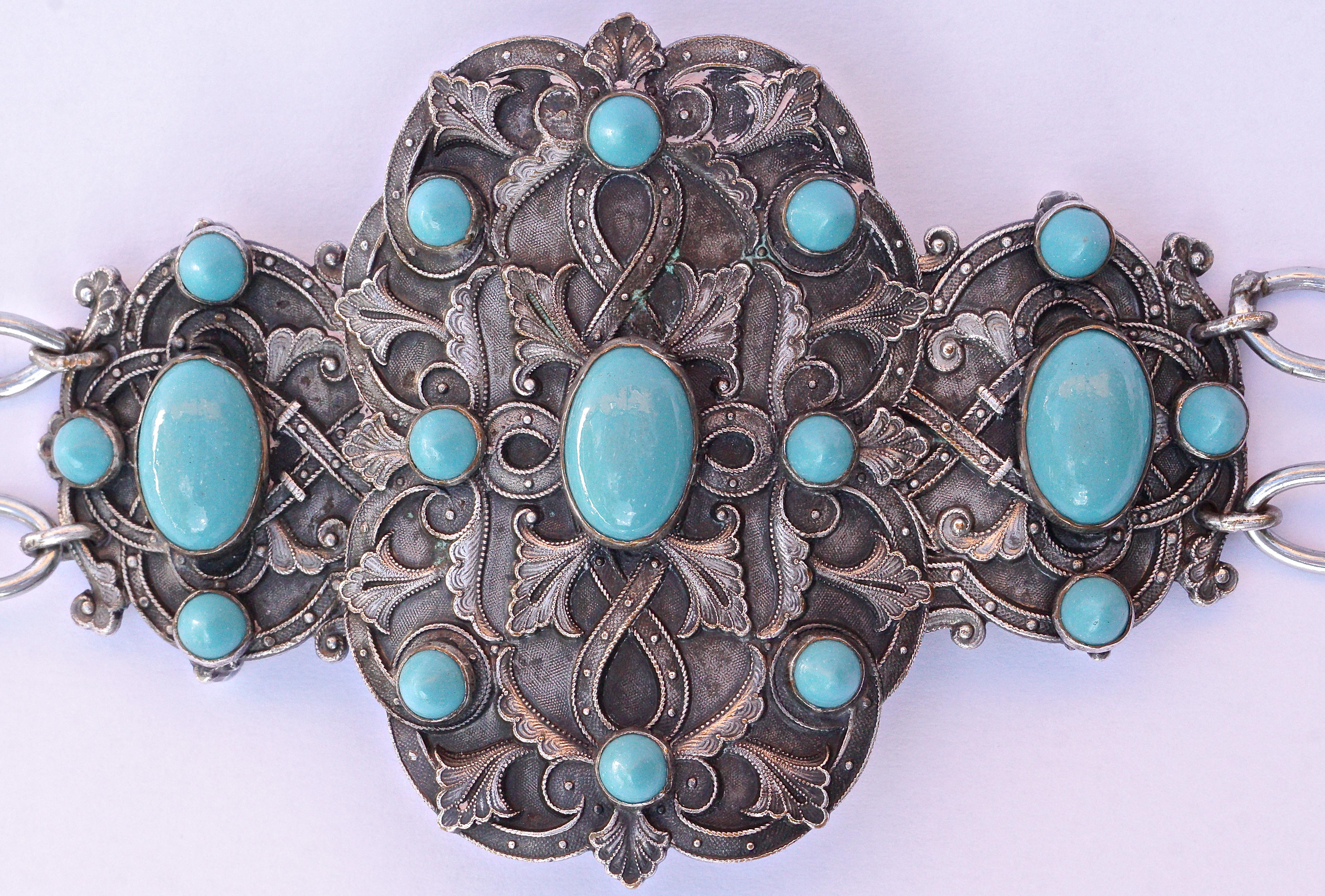 Art Nouveau Piel Freres silver plated chain belt, stamped PF on the buckle. The stunning panels are connected by chain, and feature ornate decoration with millgrain edging, set with oval and round pointed turquoise glass. The belt measures length