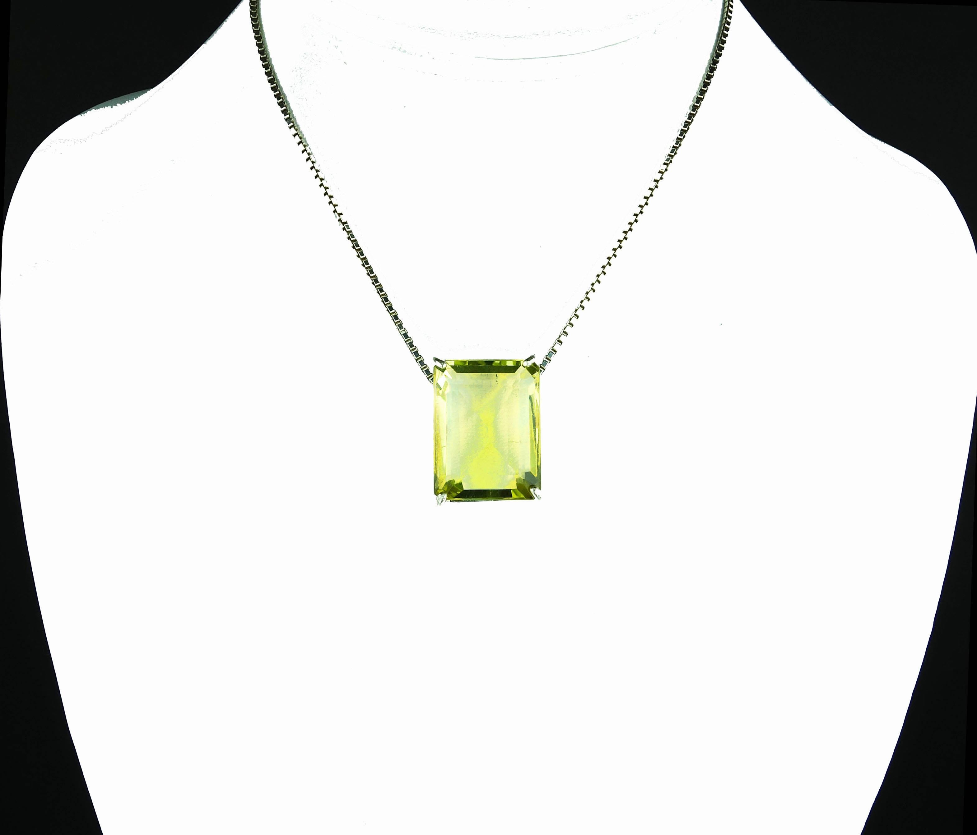 Absolutely clear sparkling 40 carat champagne quartz gemstone set in a sterling silver pendant.  The gemstone measures 17.9 mm x 23.5 mm and is clear and clean.