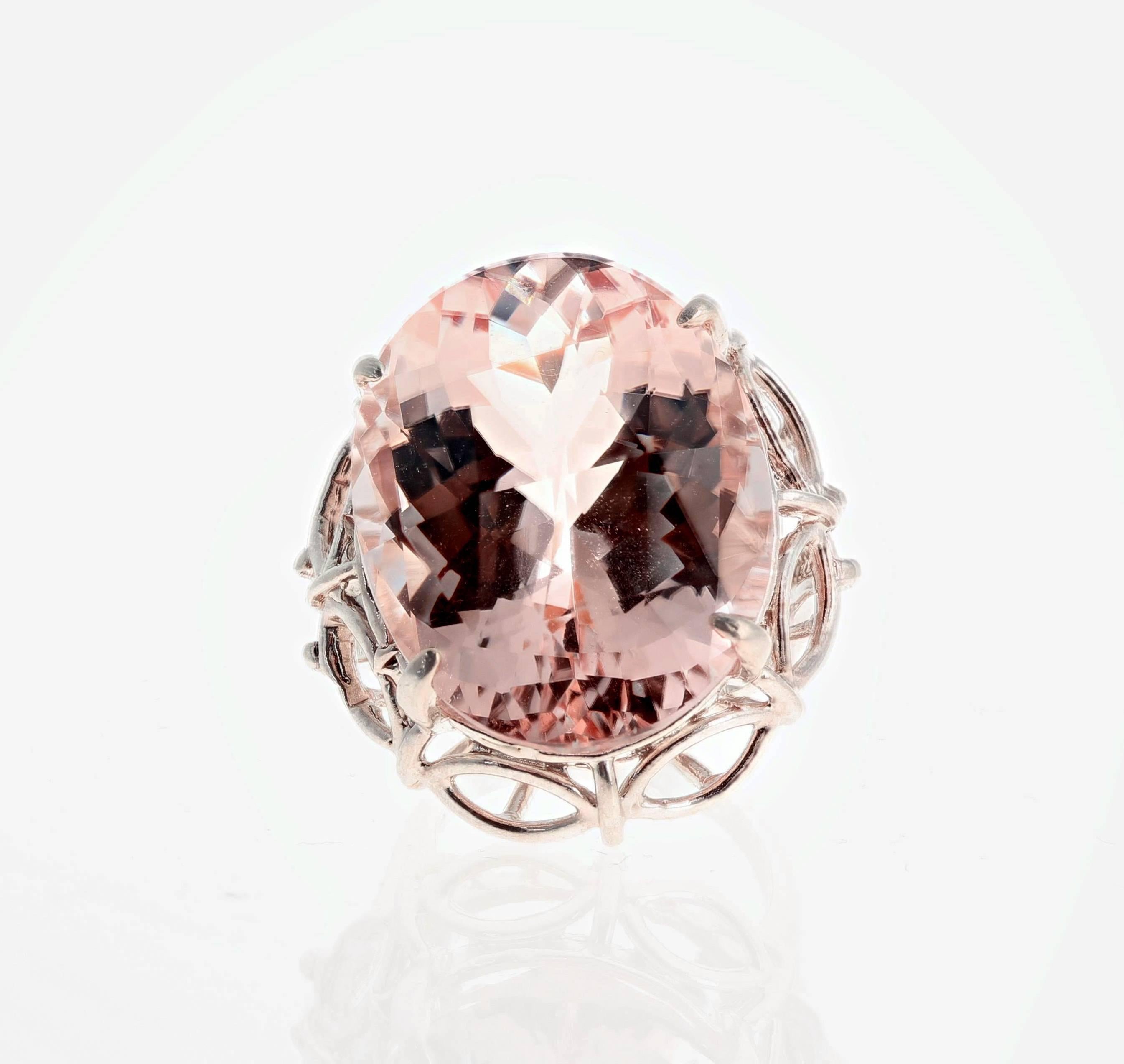 Huge gorgeous eye clean explosively sparkling 30 carat Morganite (24 mm x 18.9 mm) set in a sterling silver ring size 6 (sizable).    