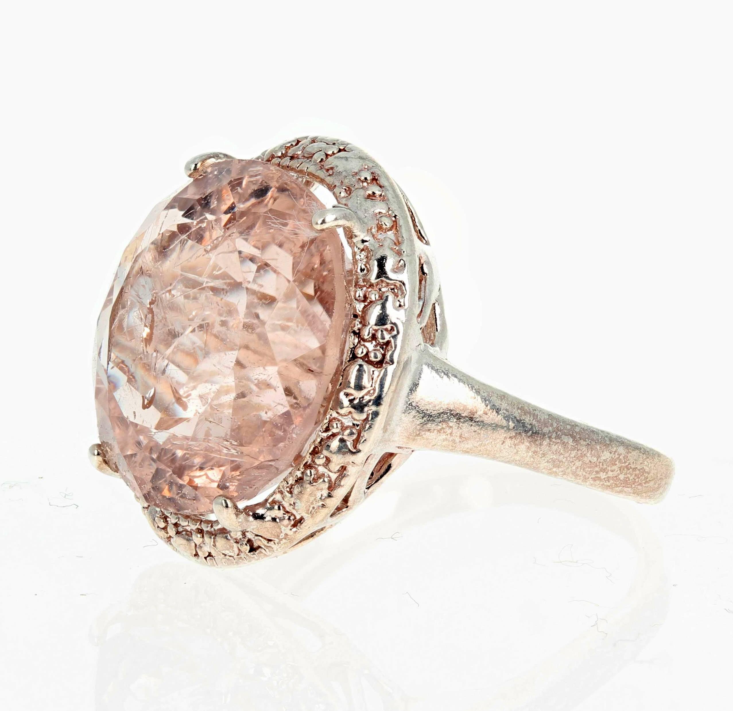 Glittering 10.6 carat natural Morganite (15.2 mm) sterling silver ring size 6 (sizable).  Spectacular optical effects in the Morganite exhibit reflections and brilliant highlights that somehow don't show up in the picture but are truly amazing.   