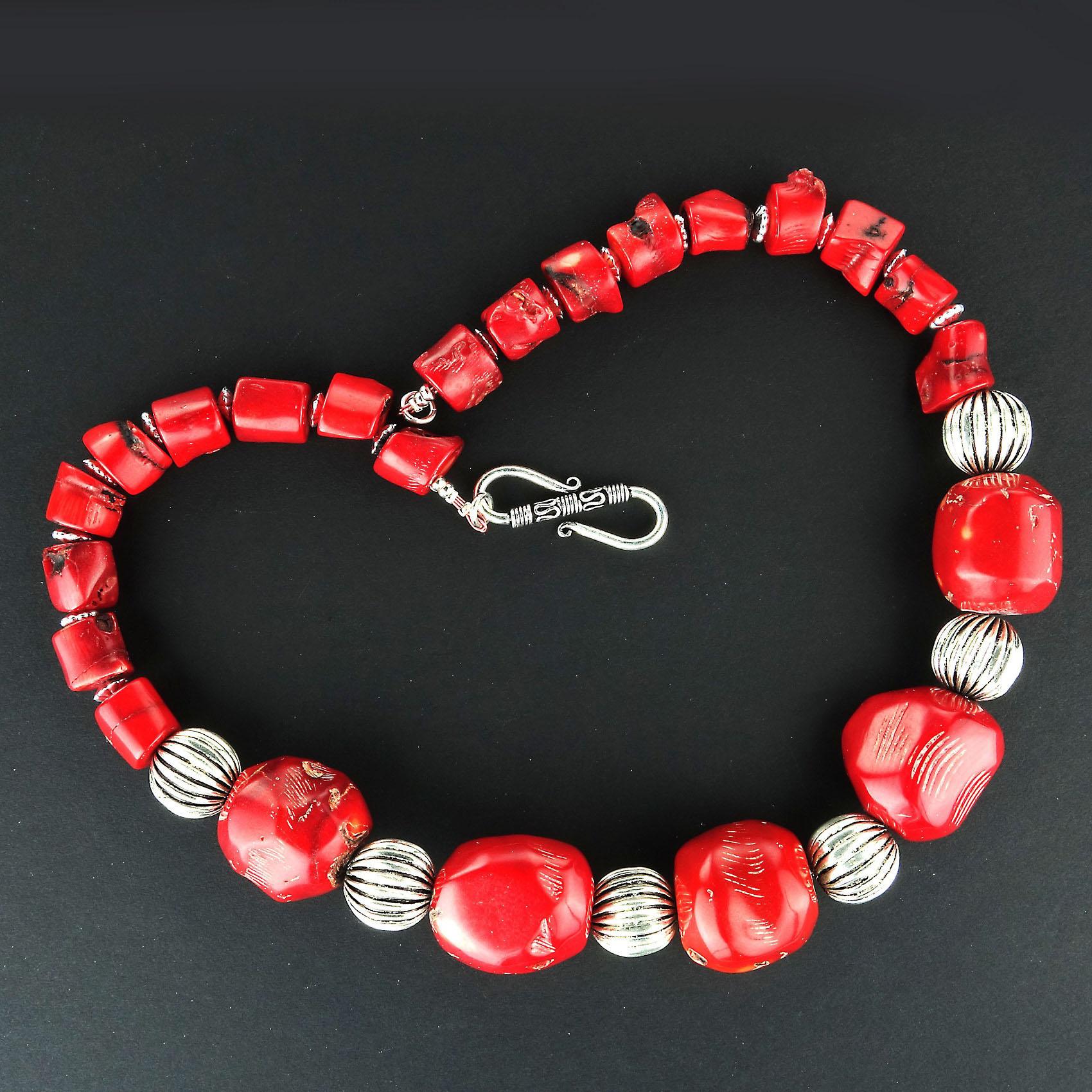Necklace of Red Bamboo Coral with Silver tone Accents.  The five large coral pieces in front measure approximates 23x21mm.  The smaller red bamboo coral a approximately 10x9mm.  This necklace is a sure winner wherever you want to wear it.   It's 19