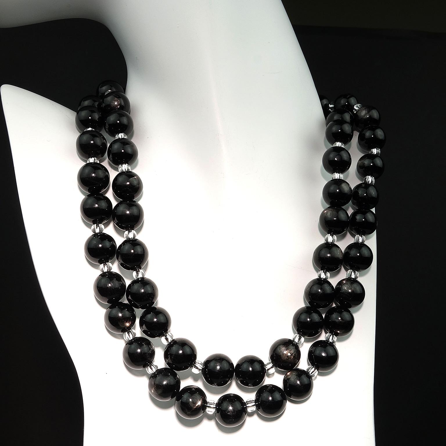 Custom made black opera lengh necklace of Hypersthene. This lovely gem is a chatoyant, glistening black gemstone mainly from Canada. We've combined it with flashing silver Czech beads to create this unique necklace. It is 33.5 inches in length which