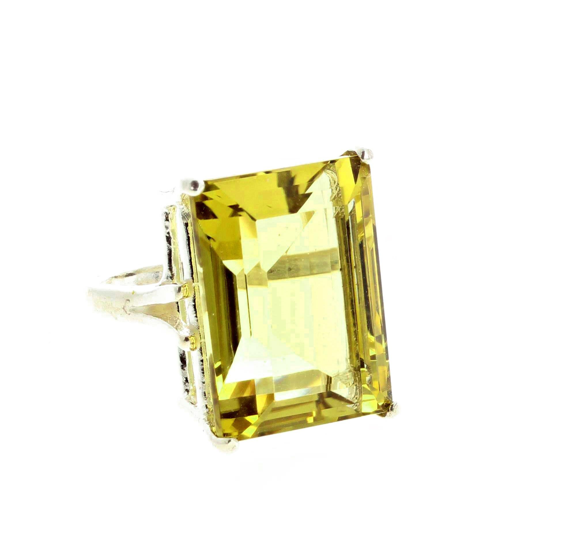 20 Carat glistening unique huge Lemon Quartz (20 mm x 15 mm) set in a sterling silver ring size 7 (sizable).  More from this seller by entering gemjunky in your 1stdibs search bar.
