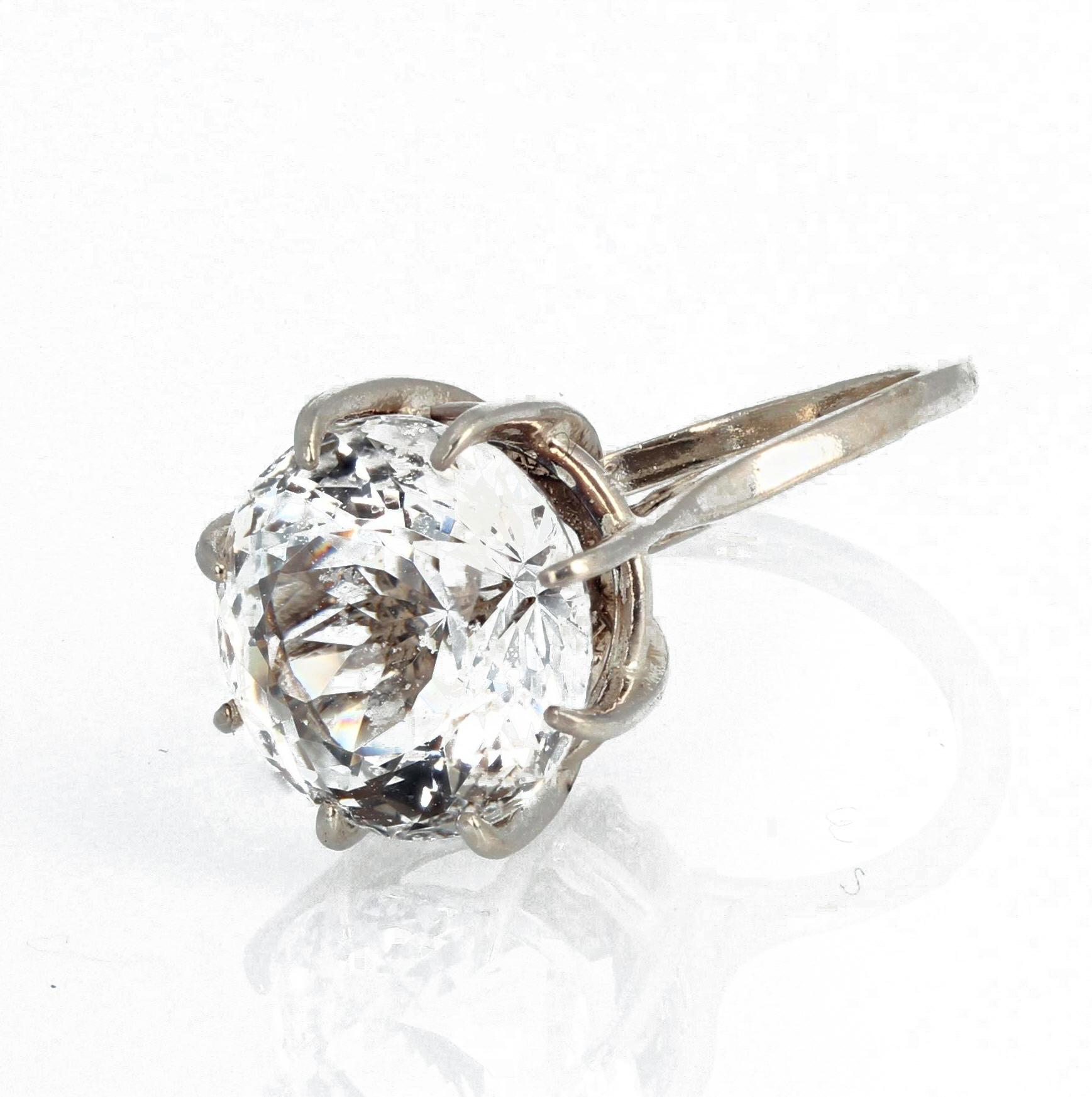 Huge natural glittering 19 carat Silver Topaz (19mm) set in a sterling silver ring size 7 1/2 (sizable). Spectacular optical effect in the topaz exhibits bright reflections and sparkling silver highlights.  This looks almost like a HUGE diamond. 