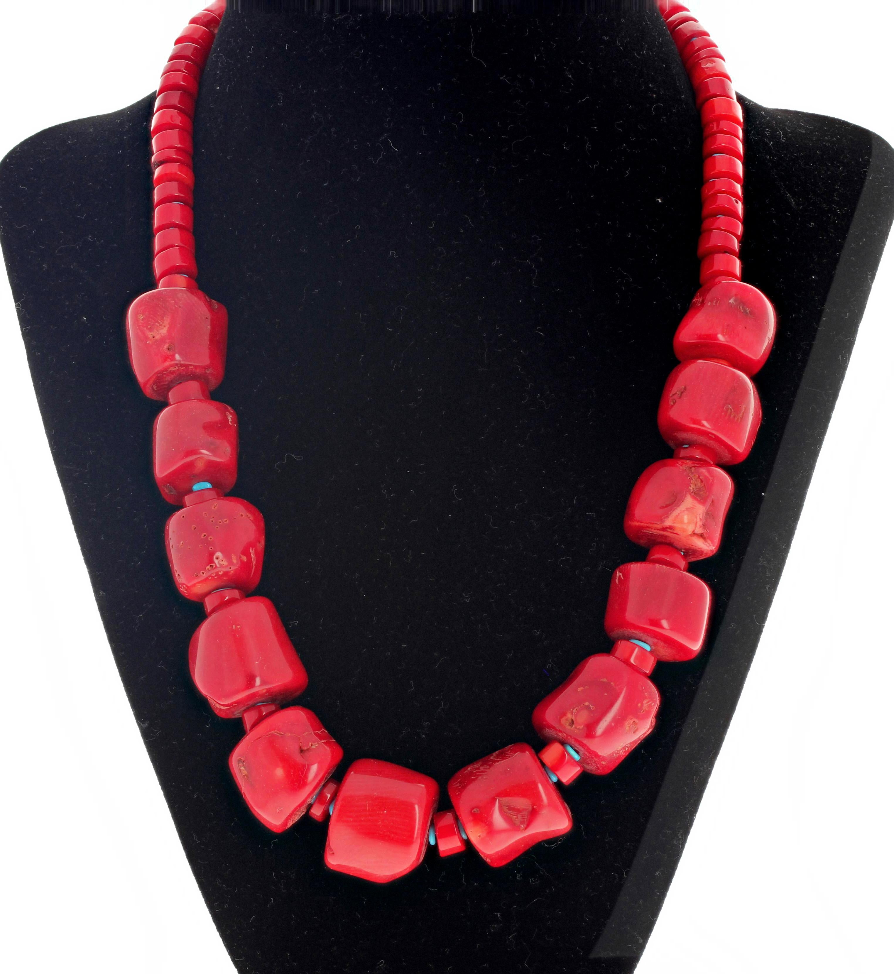 Beautiful red Bamboo Coral (15mm approximately) with blue Turquoise spacers compose this unique handmade necklace that is 20 inches long.  More from this seller by entering gemjunky in your 1stdibs search bar.