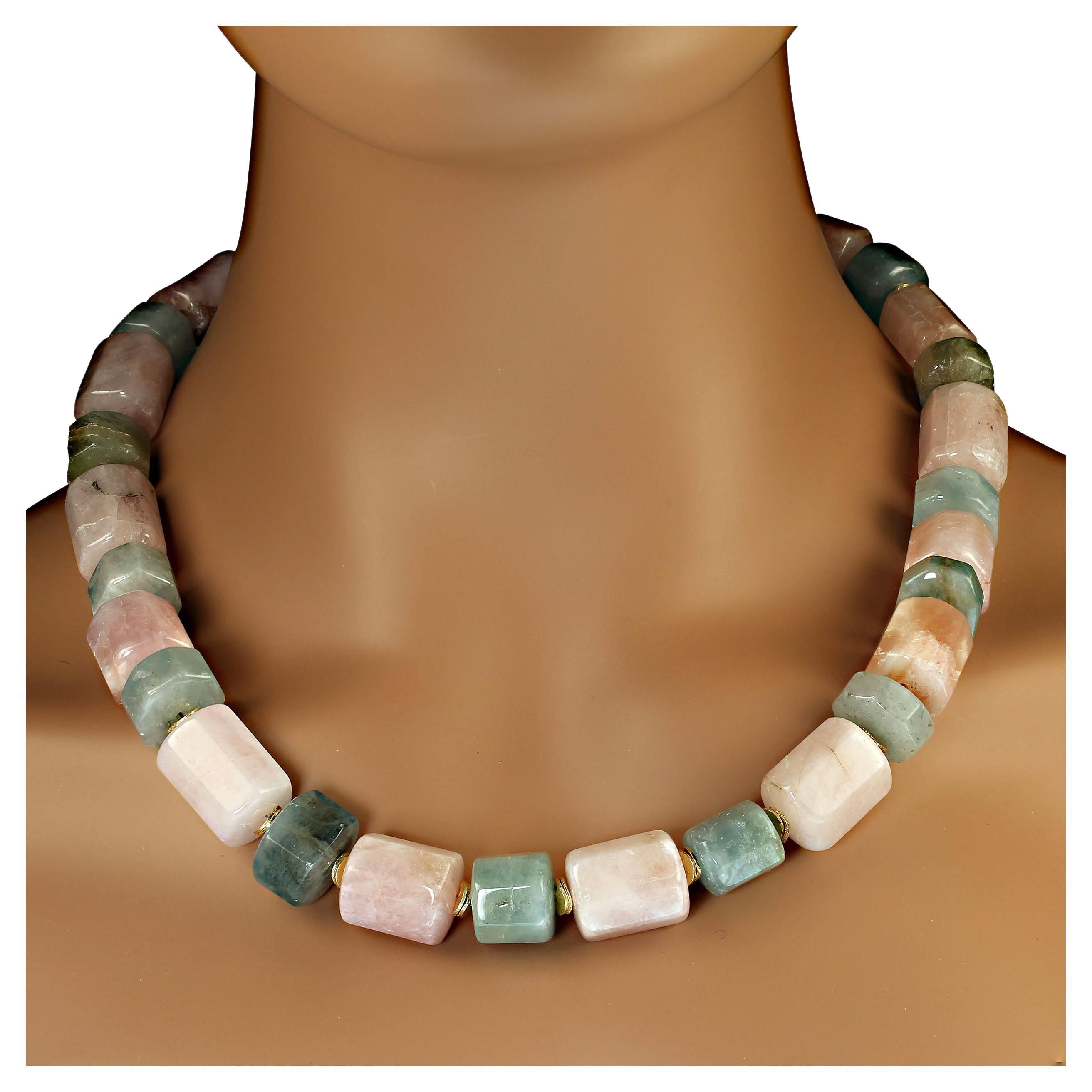 Unique 21 inch multi color beryl necklace.  This gorgeous beryl is barrel shaped in various lengths and colors, pink, green, and blue. Goldy flutters accent the lovely beryl colors.  This one-of-a-kind necklace is finished with a 14K yellow gold