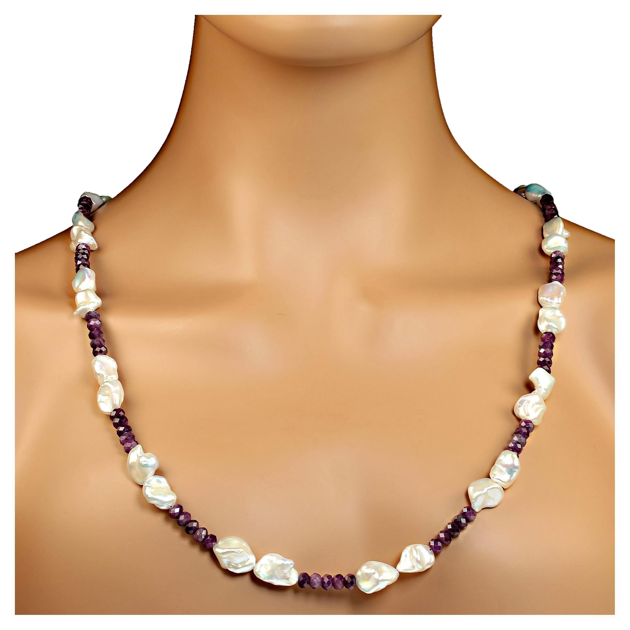 30 Inch necklace of faceted matte 6mm natural ruby rondelles and white Chinese freshwater pearls.  This one-of-a-kind necklace is finished with a diamond studded gold vermeil lobster claw clasp.  MN2336
