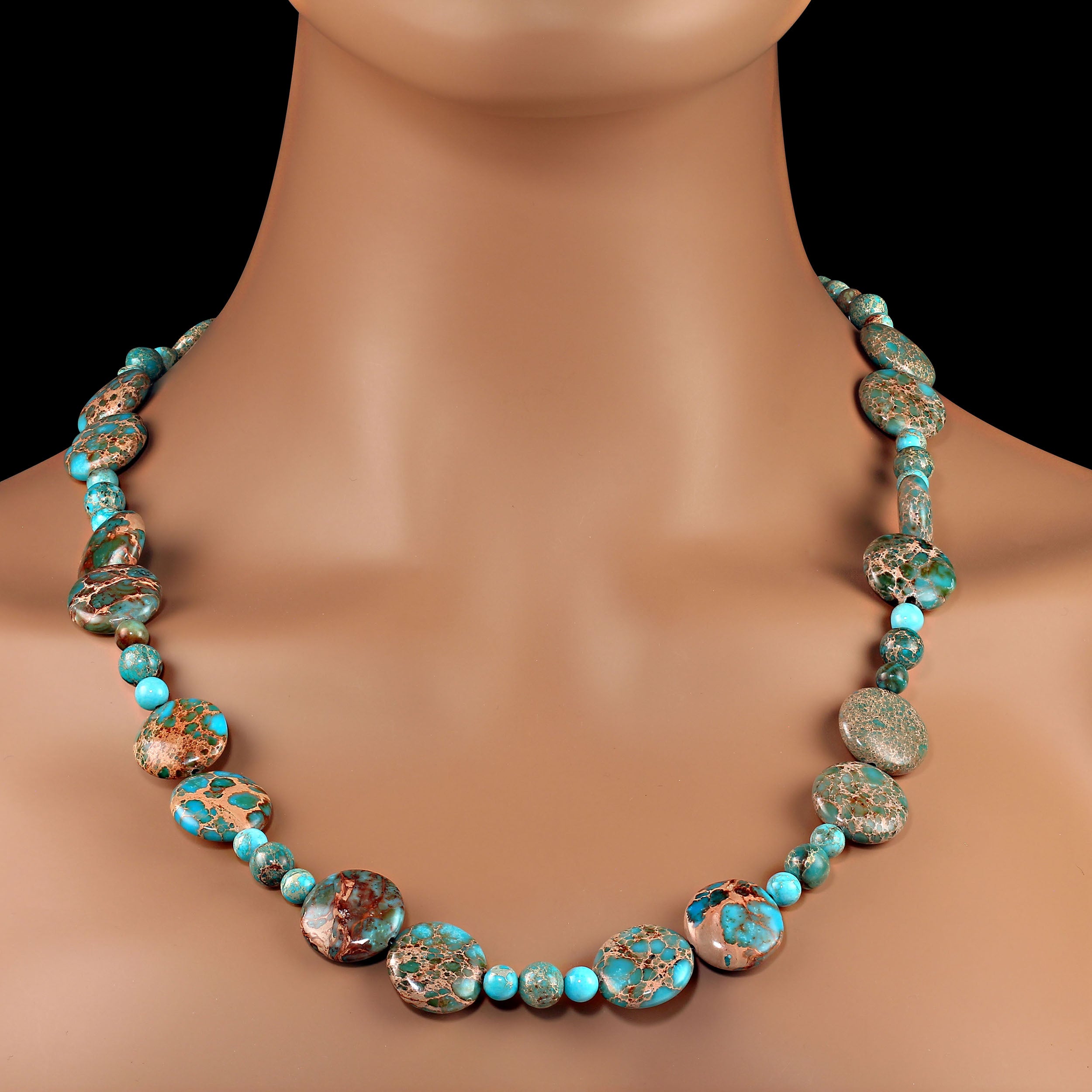 24 Inch Desert Jasper necklace in several sizes to accentuate to color and design of the matrix in the 13MM round flat tabs, as well as the round 8 and 6MM smooth beads.  These turquoise colors with browns and tans are a delight to look at.  The