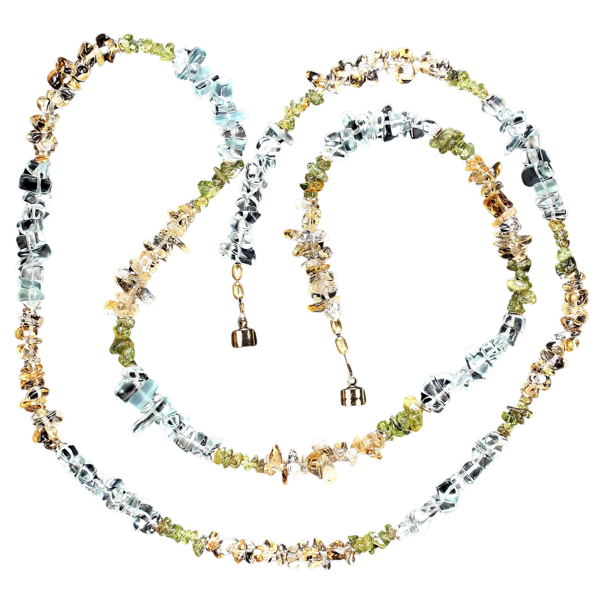 34 Inch rope of highly polished chips of citrine, aquamarine, and peridot separated with gold tone accents. At 34 inches this rope can be doubled for a completely different look.  It is secured with a gold tone magnetic clasp.  MN2377