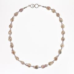 Elegant 21-Inch Keshi Pearl Necklace with Tanzanite by Aria Jewelry