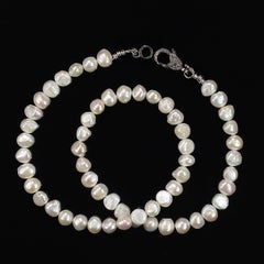 22-Inch Creamy White Pearl Necklace with Diamond Clasp by Aria Jewelry
