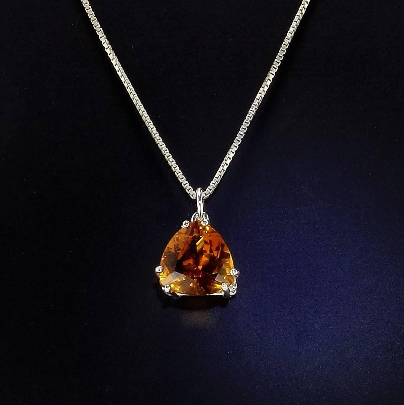 Sparkling, deep golden color Trillion Citrine in Sterling Silver Pendant. 12mm x 12mm. 5.97ct. This is a lovely wear everywhere pendant. This color brightens up everything.
Citrine is the November birthstone.