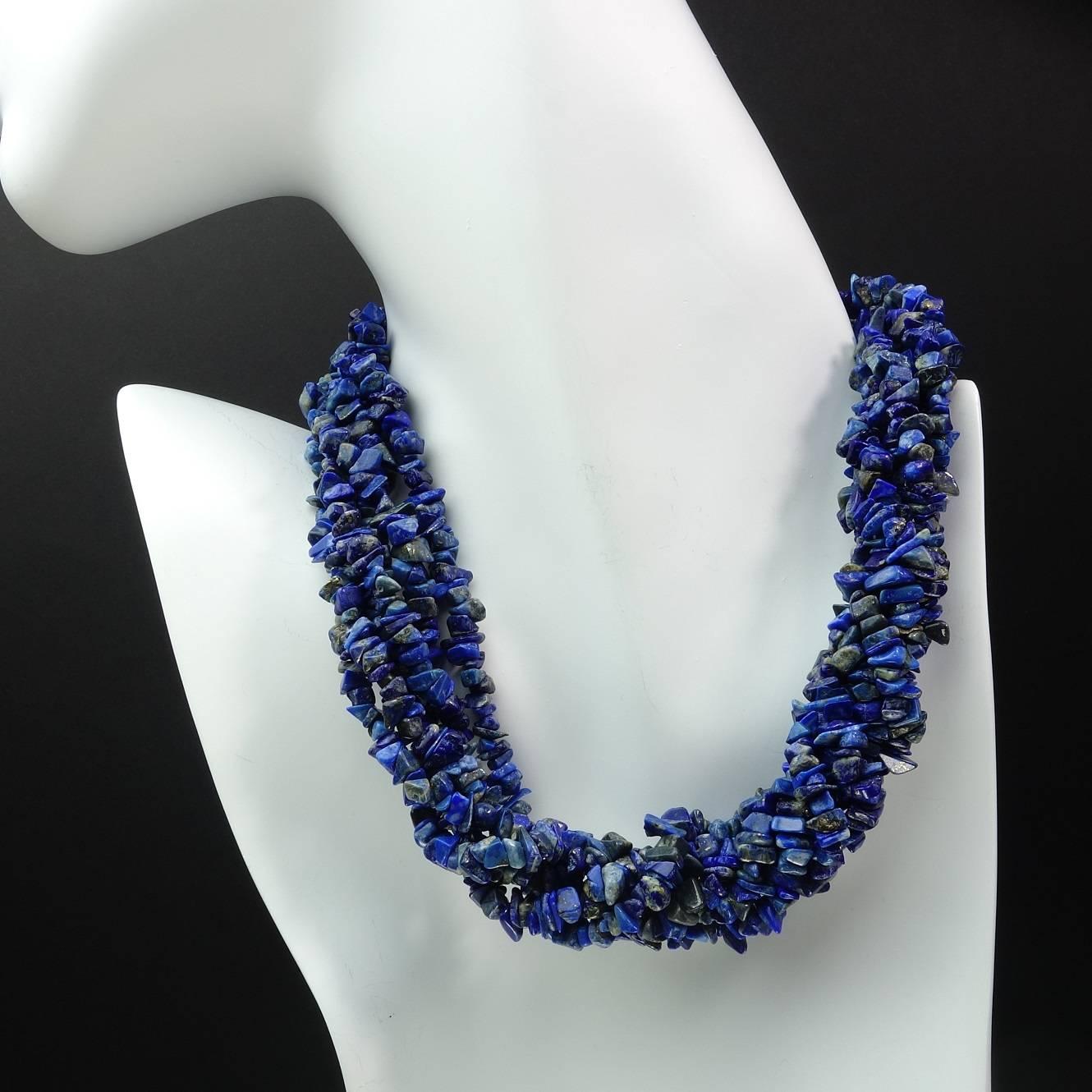 Three 34 inch loops of polished lapis lazuli chips (4-6mm) to wrap or wear as you choose with both a silver and a gold tone clasp. Striking blue color that contrasts beautifully against black or white.  The shape of the stones are uneven with an