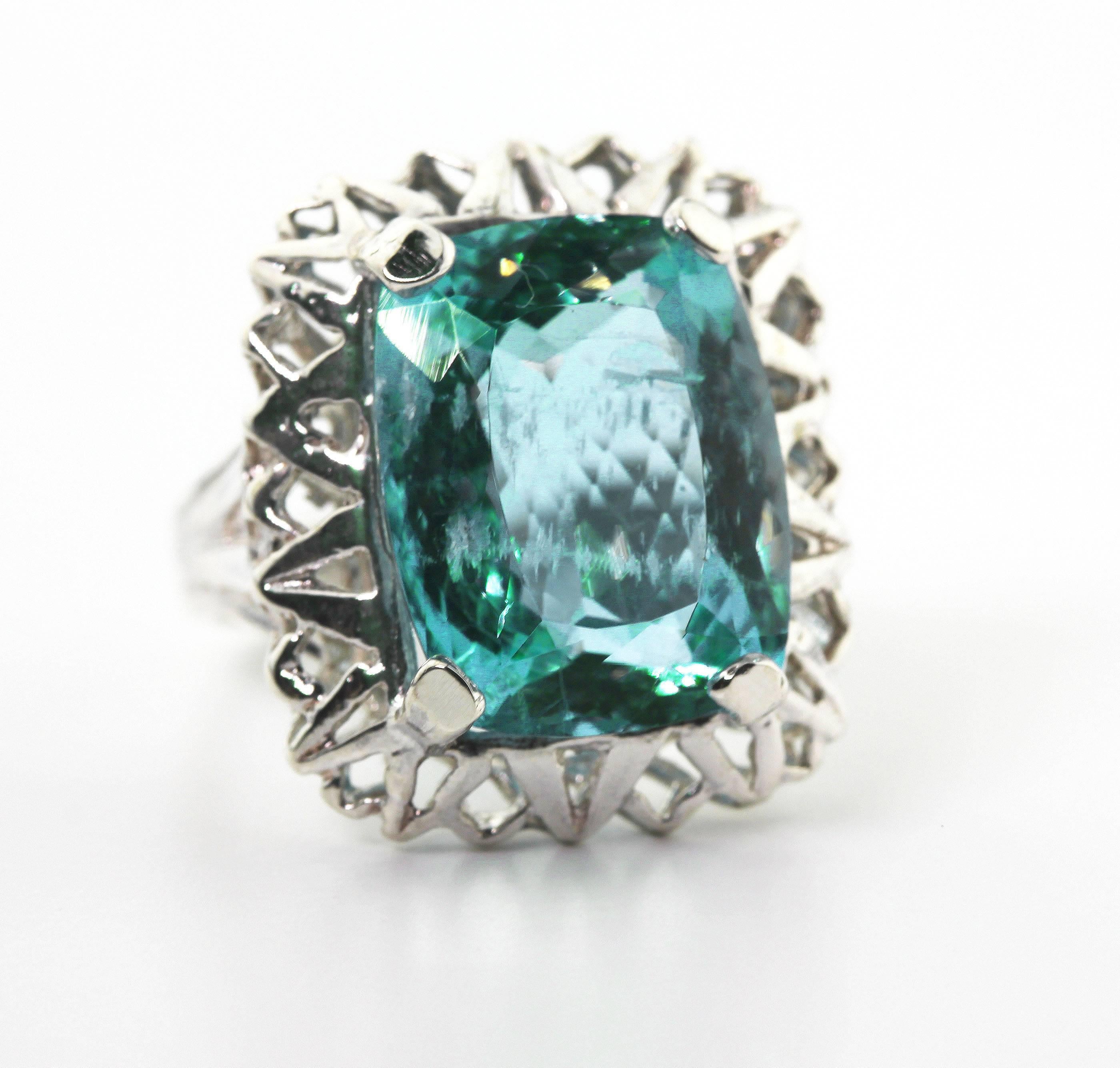 Super brilliant glittering 8.25 carat Aquamarine (14.88 mm x 11.6 mm) set in a sterling silver ring size 5 (sizable).    More from this seller by putting gemjunky into 1stdibs search bar.