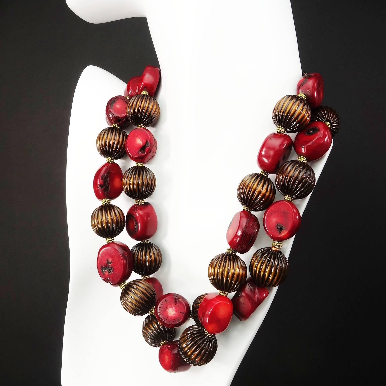 Double strand necklace of Deep Red Bamboo Coral and Etched Bronze beads with bali bead spacers. This unique Choker, 17inch, is perfect for Fall/Winter, its colors are complementary to all your cold weather wardrobe. The gold tone hook clasp is easy