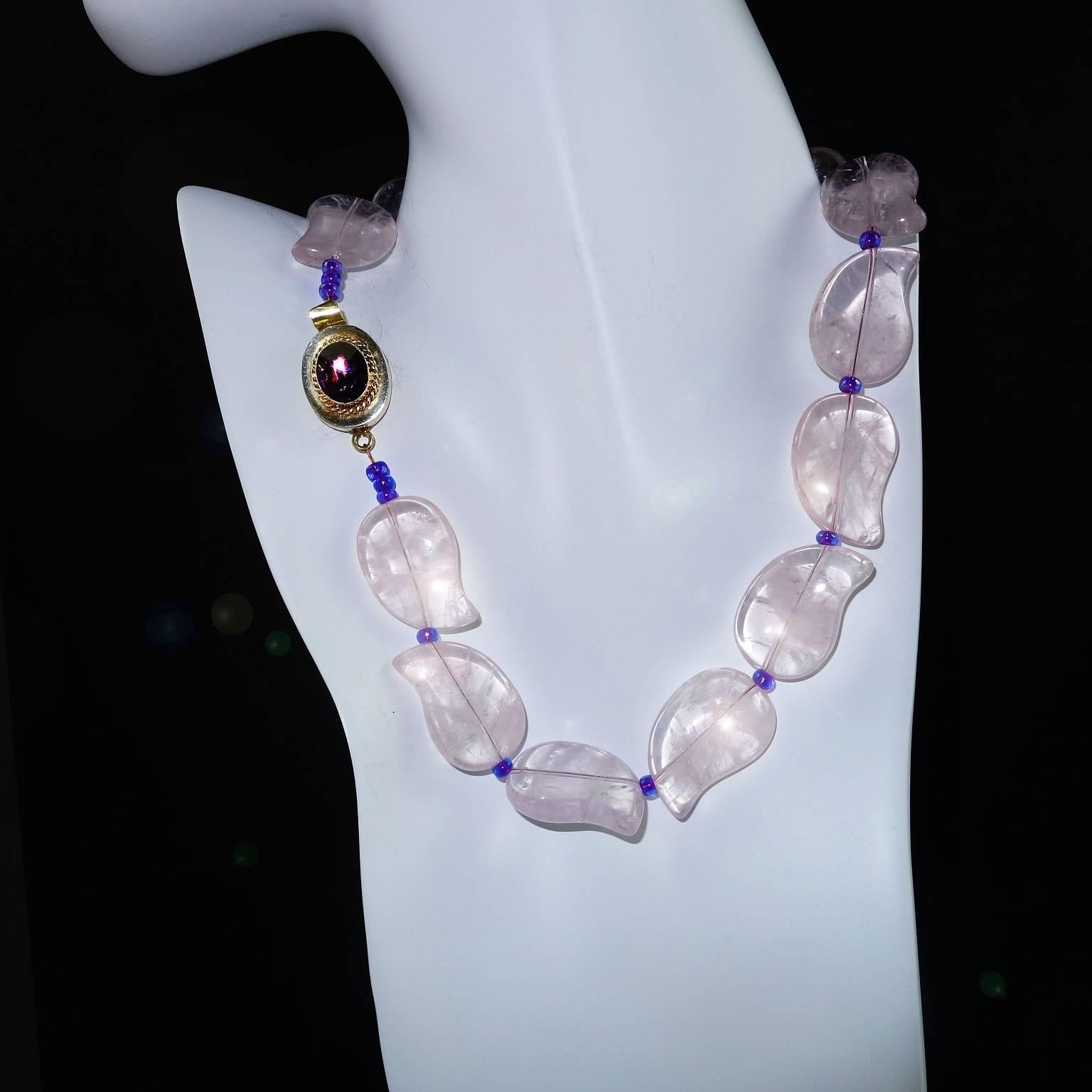 Rose Quartz Leaf Motif Choker length Necklace (17.5inches).  Each delicate leaf is glowing Rose Quartz with just enough inclusions to reflect light to sparkle and dance in the light.  In addition, there are purple Czech crystal beads to accent the