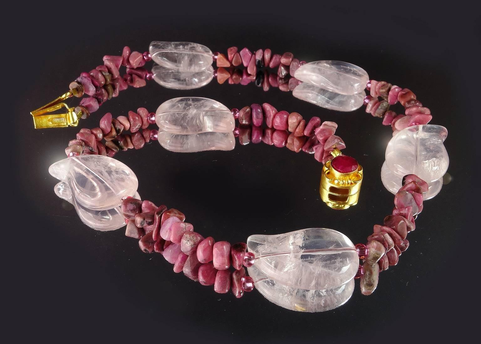 Necklace of leaf Shaped Rose Quartz and Polished Rhodonite Chips. The contrast of sparkling soft Rose Quartz and deeper Opaque Pink Rhodonite is fantastic. The Rose Quartz is accented with pink Czech beads. The box clasp is gold tone accented with