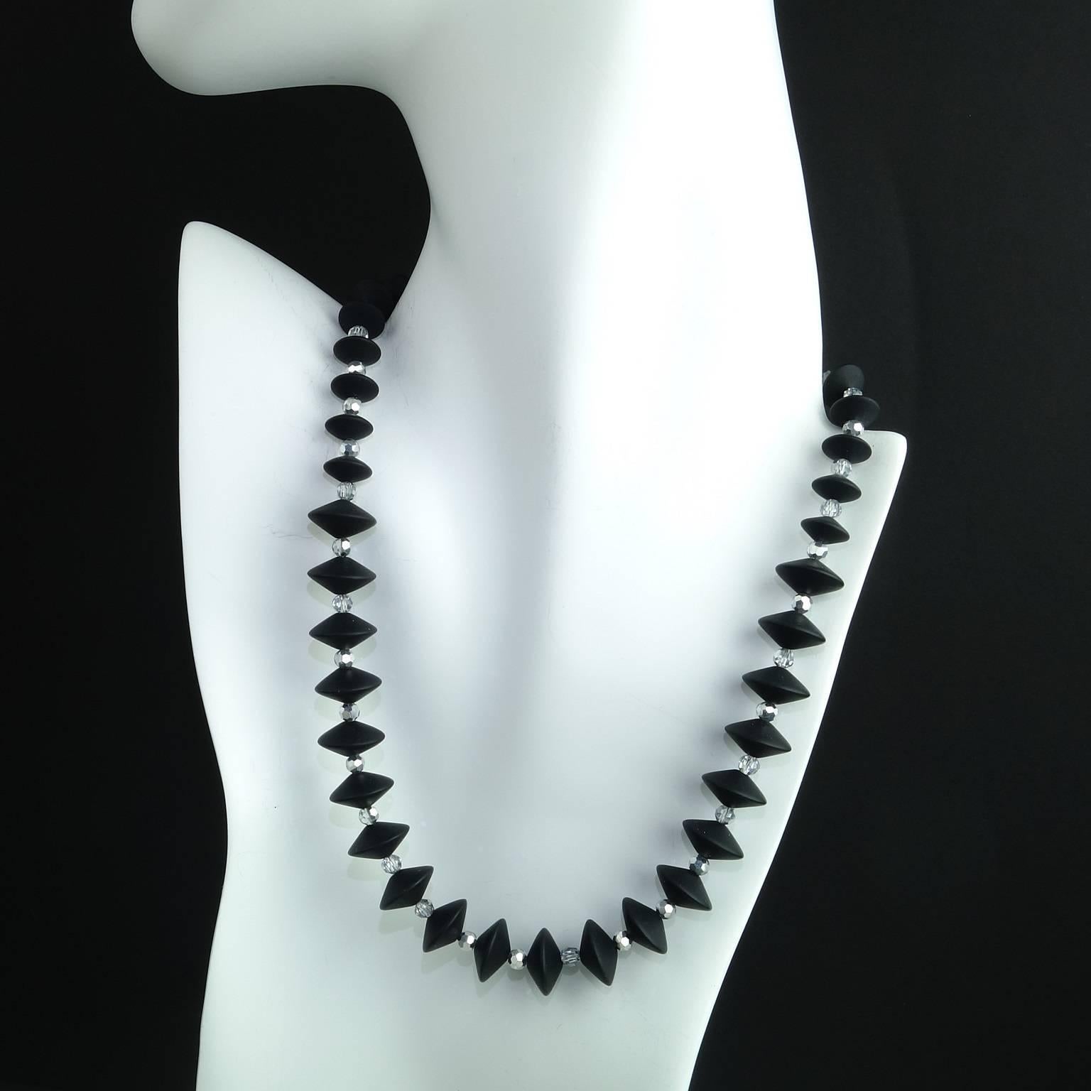 Sparkling Holiday necklace of two sizes of brushed elongated onyx rondels, 14mm and 10mm. alternating with sparkling faceted silver crystals (4mm). This necklace sparkles and pops, black and silver, terrific for the Holidays. It is 17 inches in