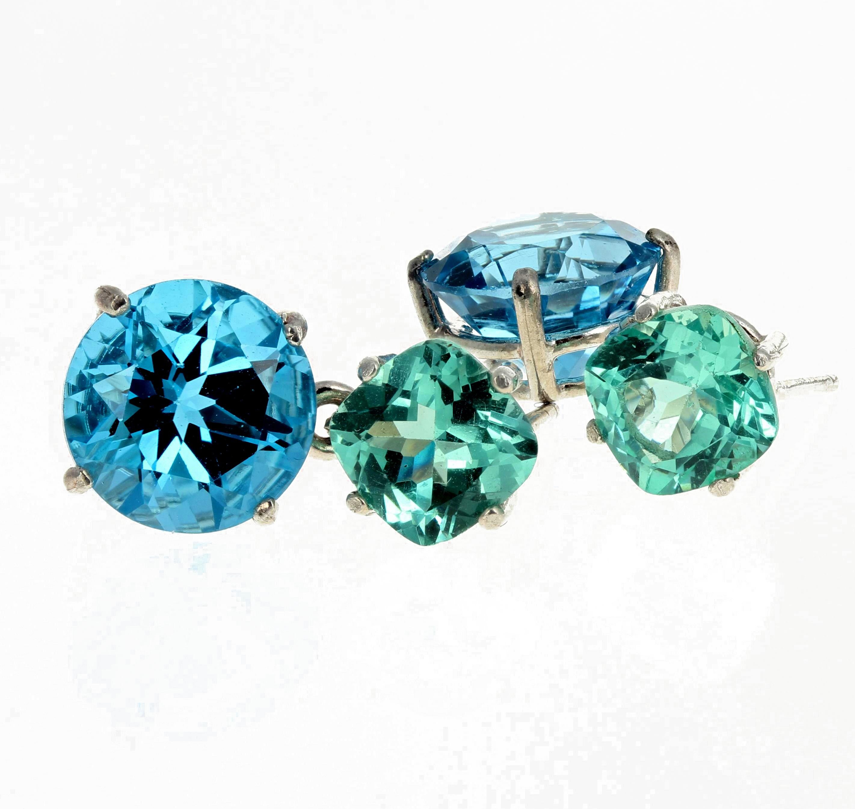 These gorgeous brilliant 2.58 Ct sparkling blue green cushion cut natural Apatite enhance the glittering round swinging 9.6 Ct blue Topaz set in swinging sterling silver stud earrings.  This hangs 20 mm long.  The blue green Apatites are