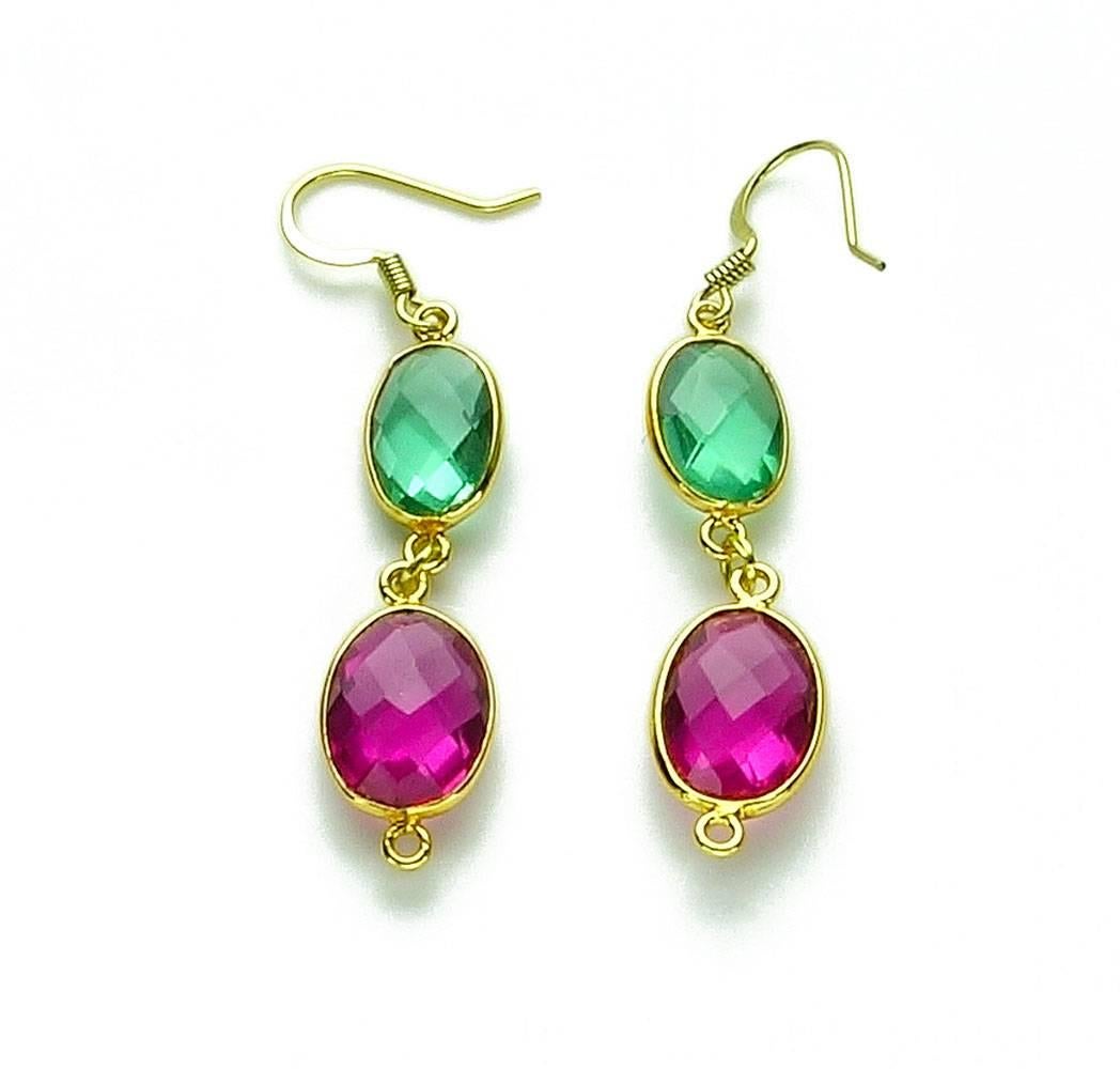 Swinging sparkling dyed pink and green Quartz gold plated hook earrings.  They are 2 inches long from top of the hook to the bottom of the lower gemstone setting.  These are fun bright colors and go with everything day or night. 