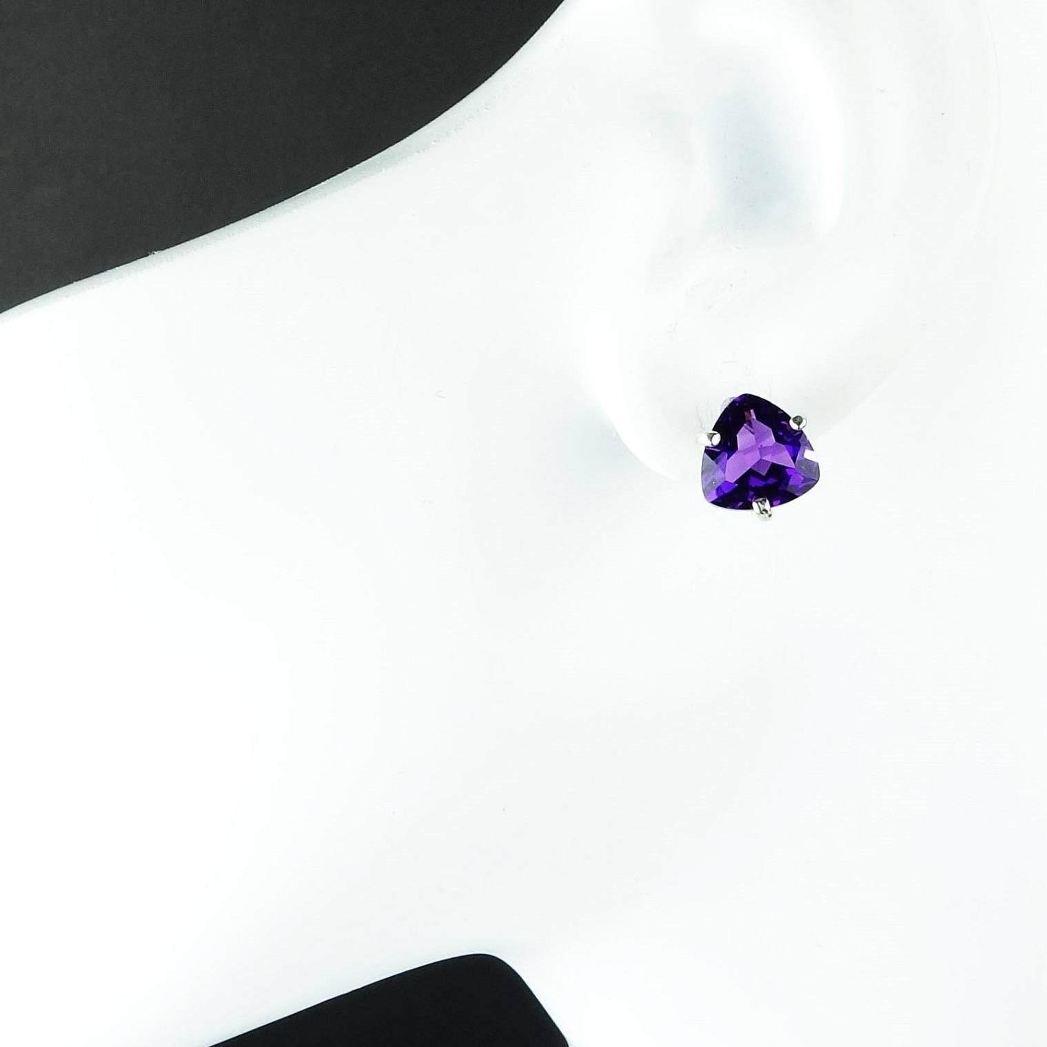Bright, sparkling Purple Amethyst Trillion Earrings. These lively post back earrings weigh 4.52cts and are 9mm. the  Amethyst is the February Birthstone. These great earrings are the perfect complement to any and all of your ensembles.
