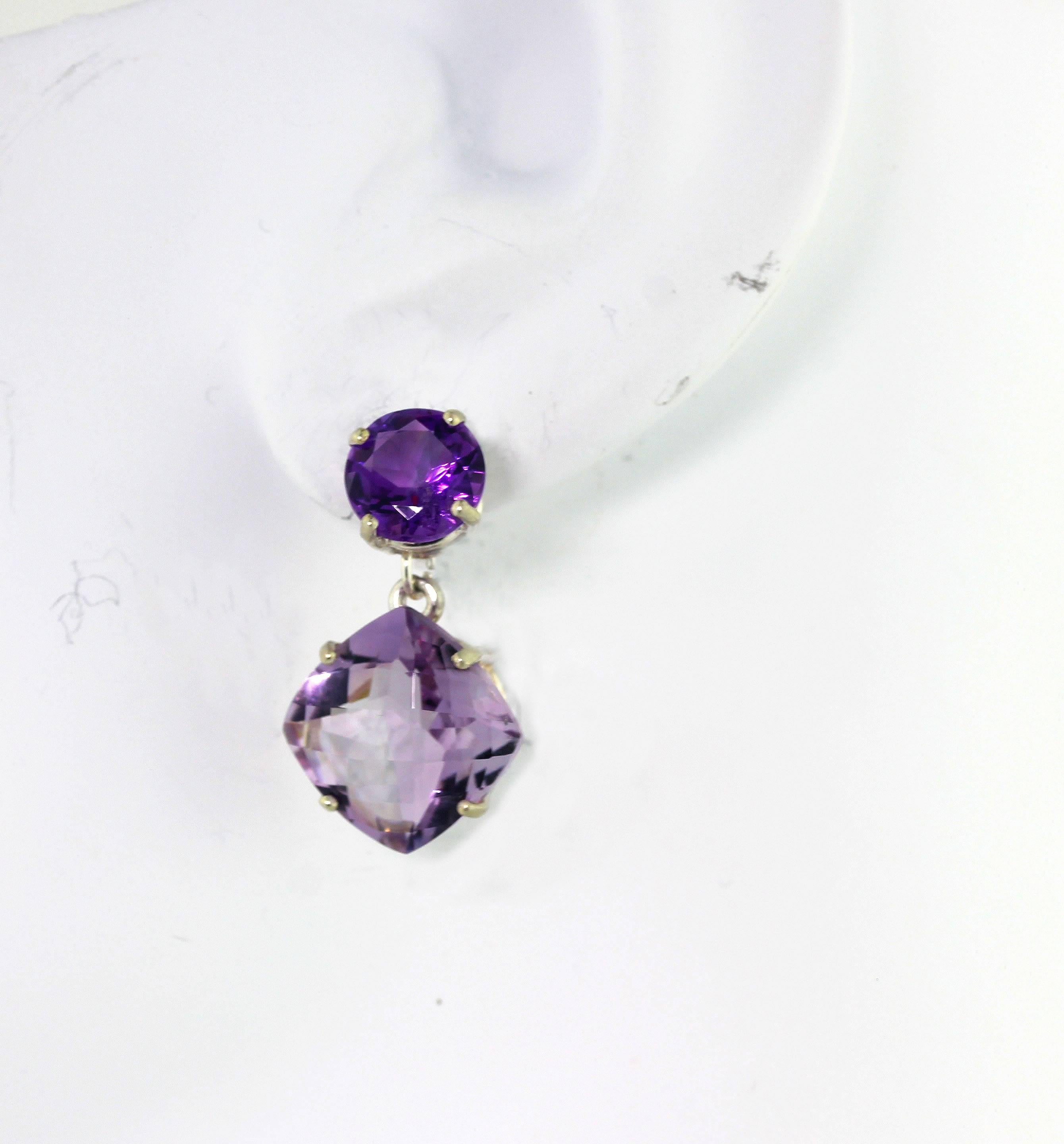 9.8 carats of brilliant pink flashing round purple Amethysts (8 mm) dangle these lovely sparkling 11.9 carats of checkerboard cut cushion shaped Rose of France Amethysts (12 mm x 12 mm) set in Sterling Silver stud earrings.   The earrings measure
