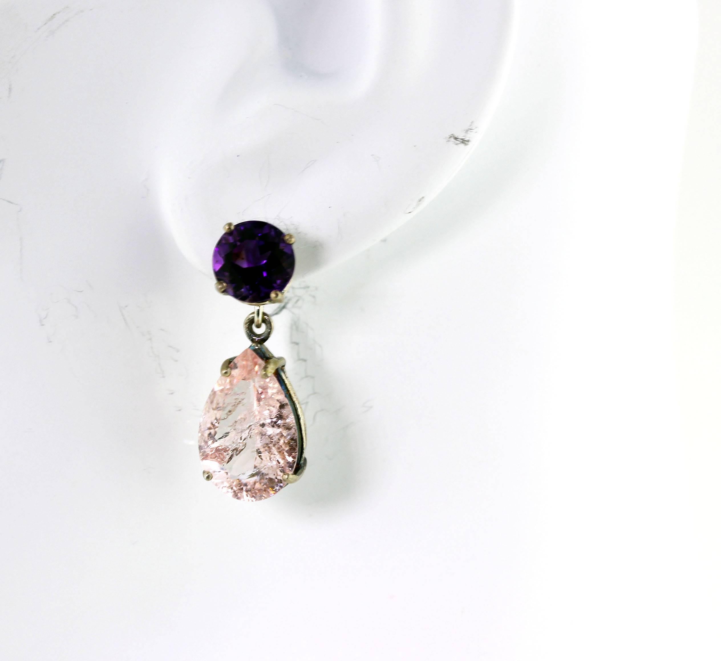 1.64 carats each of round (8mm) gem cut brilliant Amethyst with bright pink flashes dangle 5.4 carats each of sparkling krinkle (naturally included) Morganite (15 mm x 10 mm) in sterling silver stud earrings.  They measure 1 inch long.  The